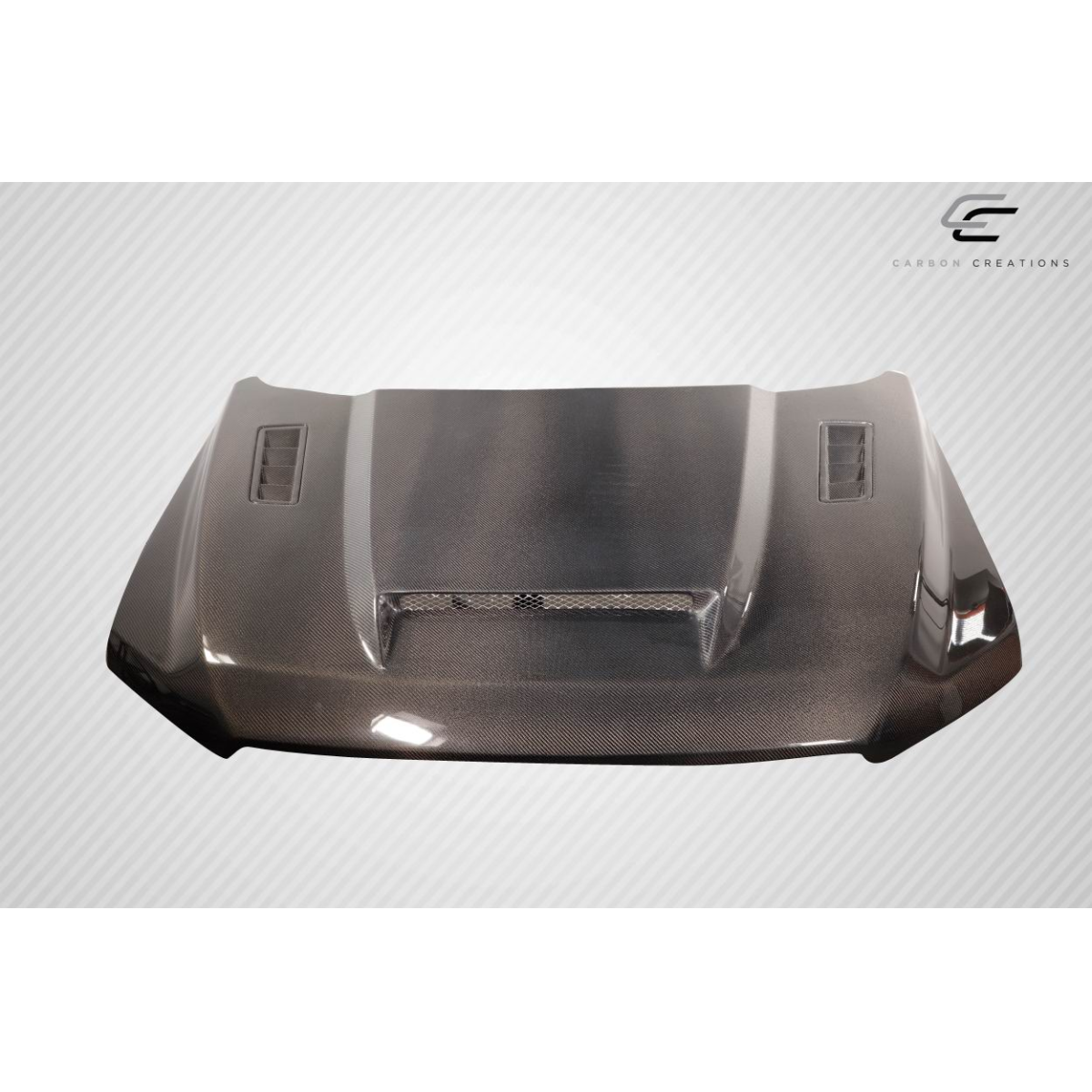 Modify your Ford F-150 2015 with our Exterior/Hoods - Angled view of the hood part  from the front