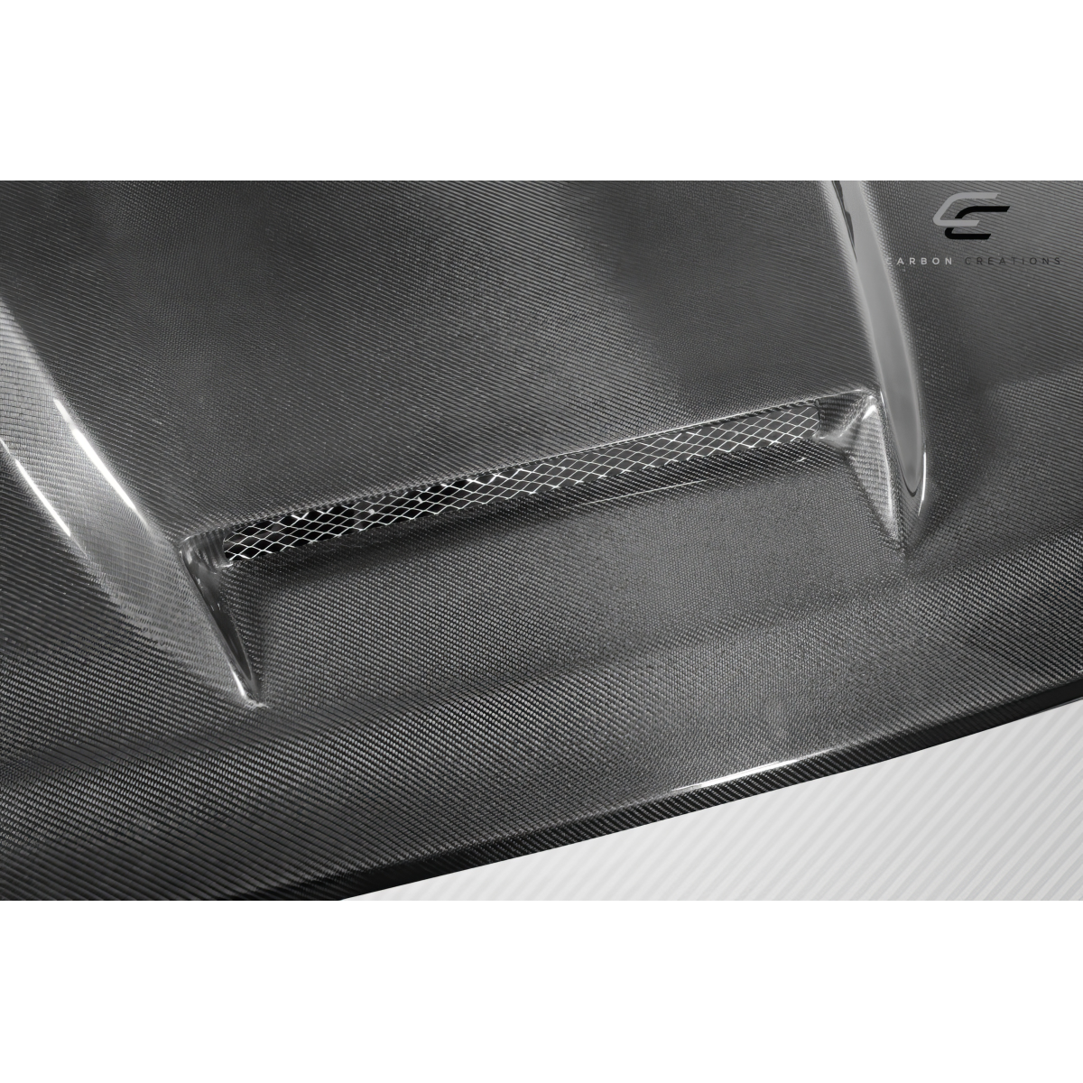 Modify your Ford F-150 2015 with our Exterior/Hoods - Angled view showcasing carbon fiber texture