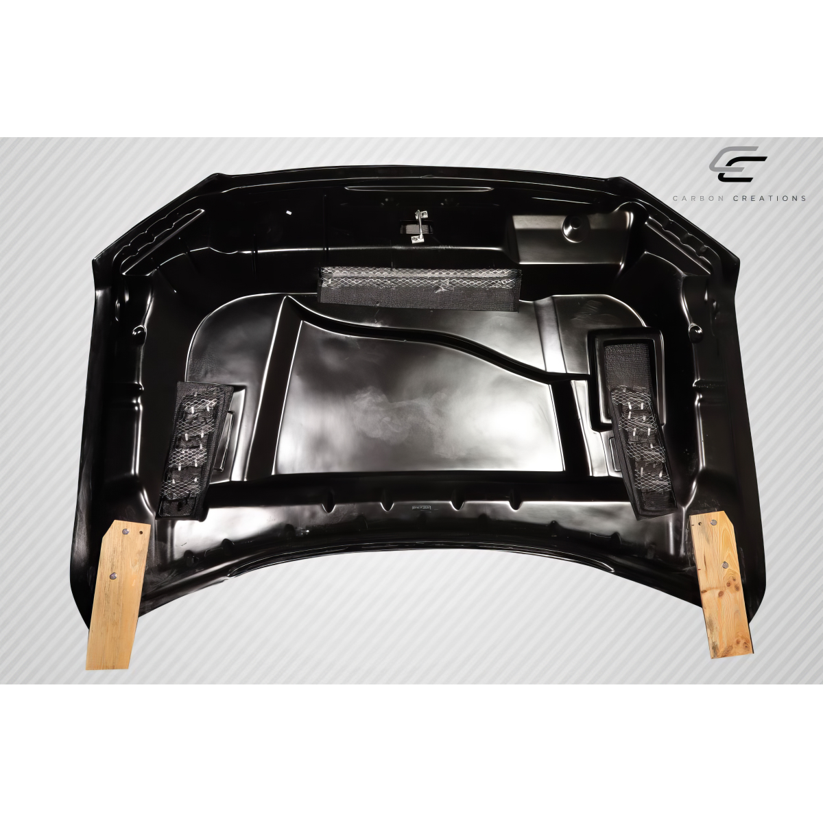 Modify your Ford F-150 2015 with our Exterior/Hoods - Top view of carbon fiber hood at an angle