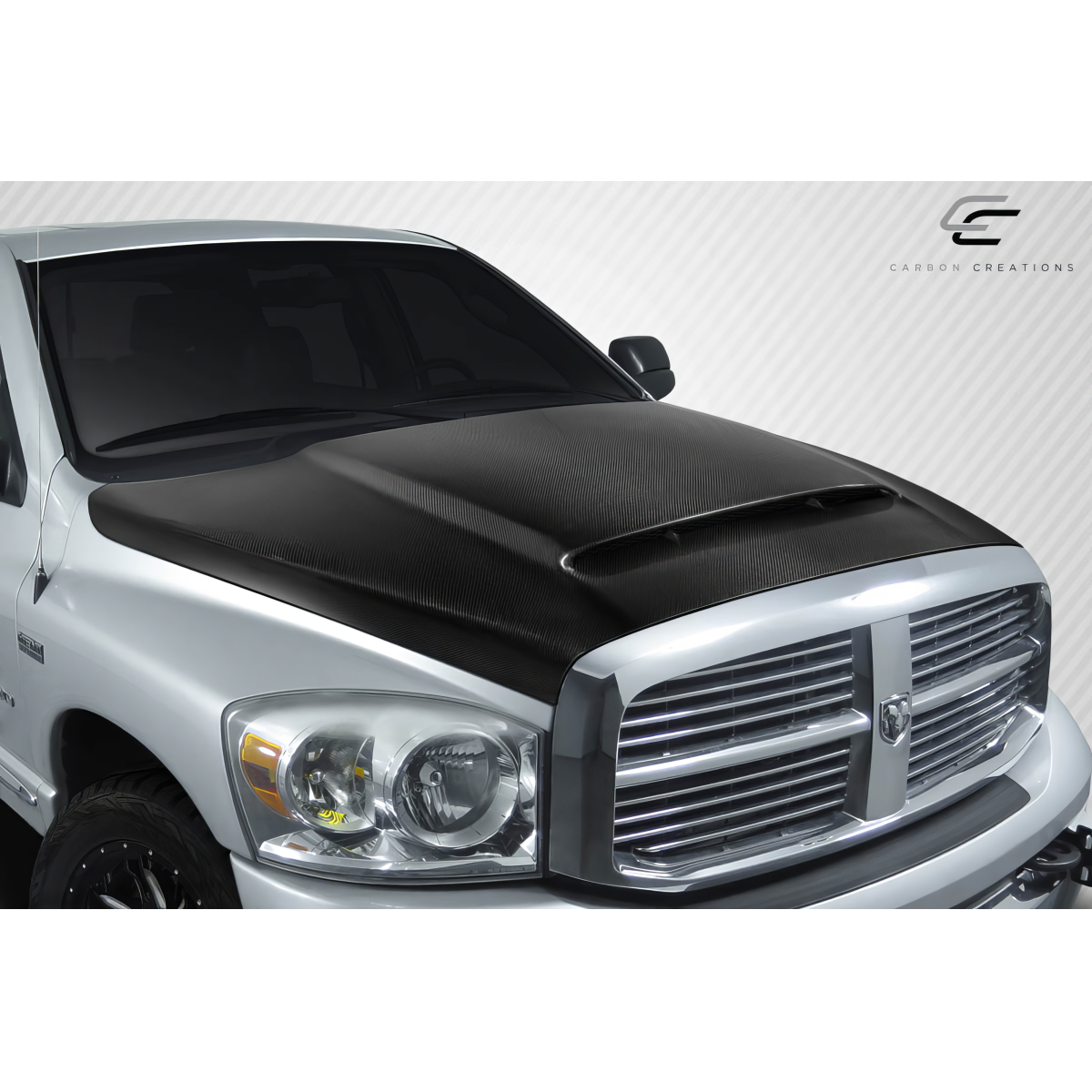 Modify your Dodge Ram 2002 with our Exterior/Hoods - Front angle view showcasing carbon fiber hood