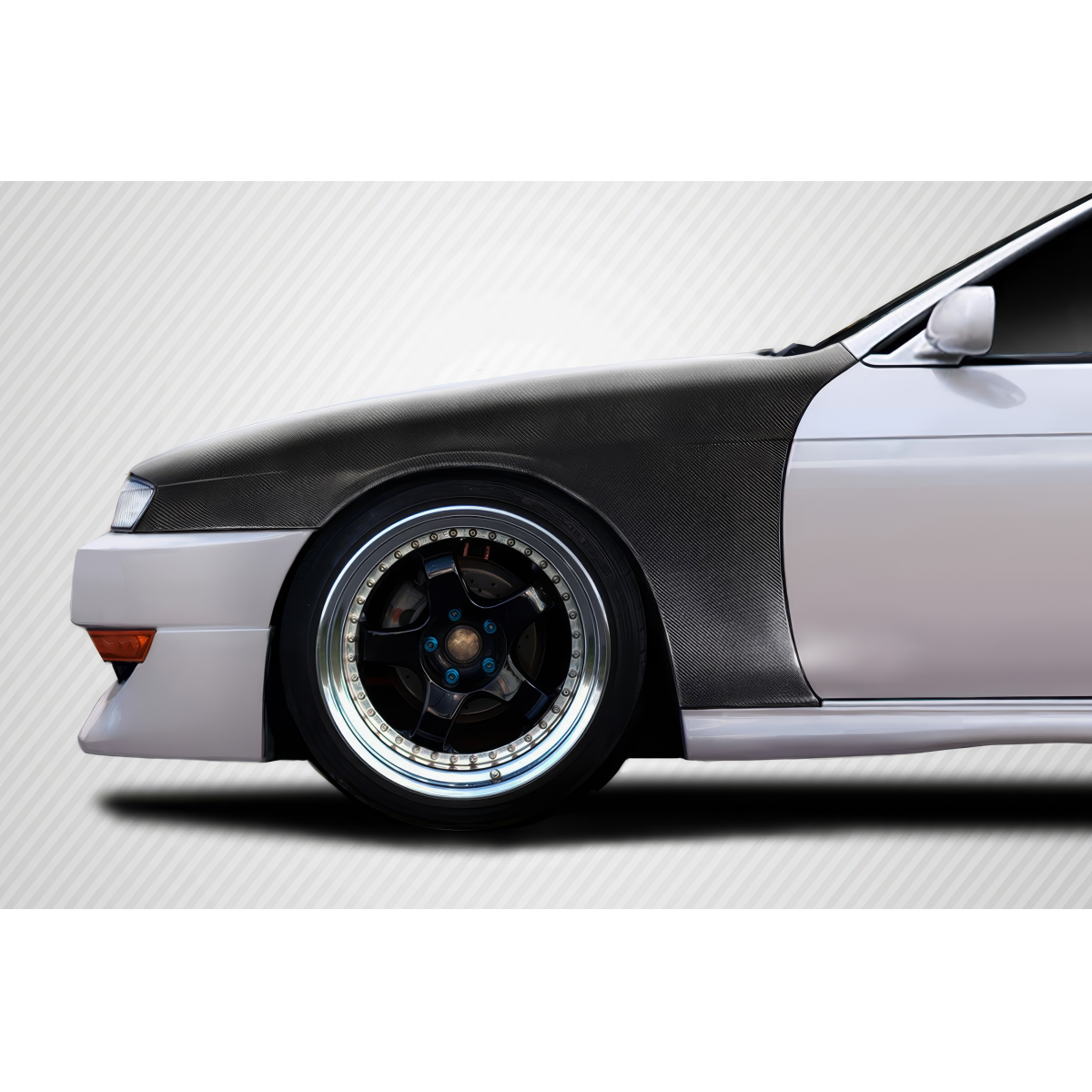 Modify your Nissan 240SX 1997 with our Exterior/Fenders - Side view with focus on fender and wheel