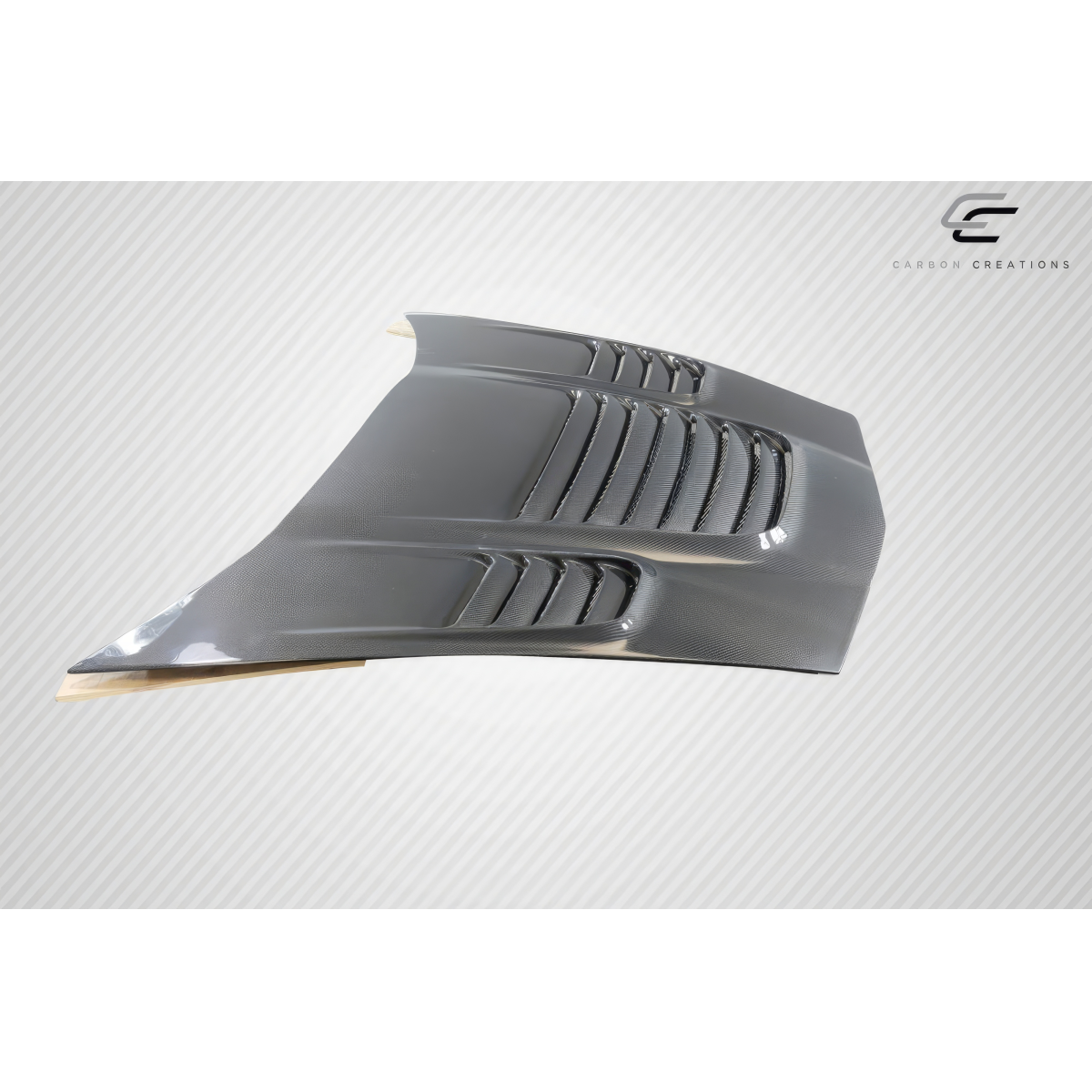 Modify your Chevrolet Corvette 2005 with our Exterior/Hoods - Part viewed from a slight angle from the front