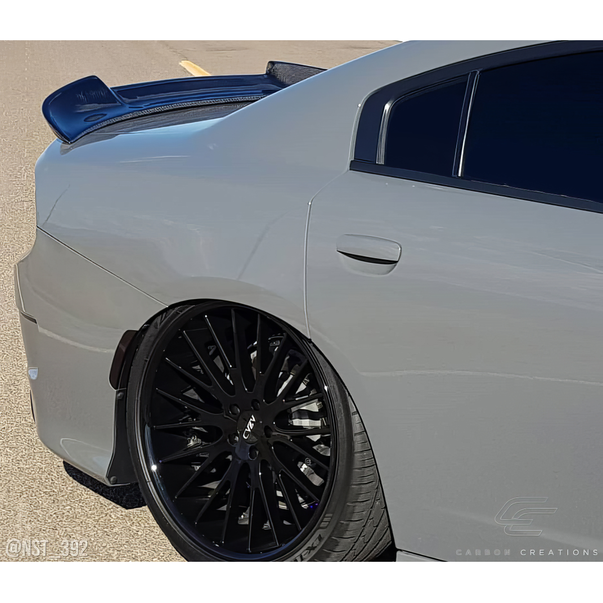 Modify your Dodge Charger 2015 with our Exterior/Wings - Image shows rear angle of vehicle part