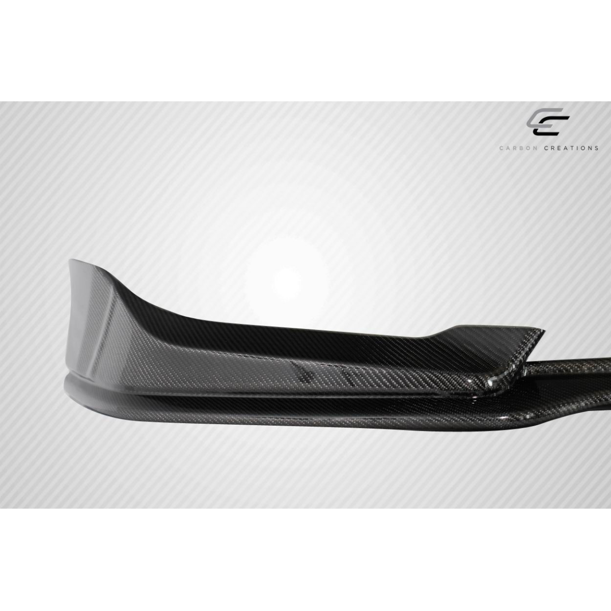 Modify your Honda Civic 2016 with our Exterior/Front Bumpers or Lips - Angled view of a carbon fiber front lip