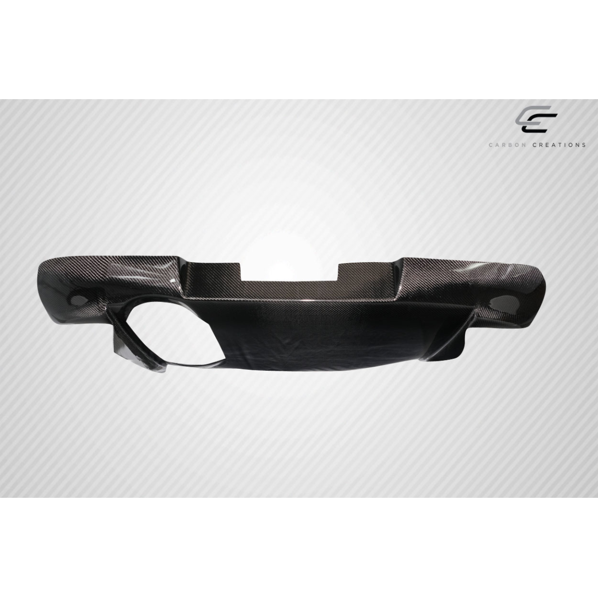 Modify your Subaru Impreza 2002 with our Exterior/Diffusers - Angled view of a carbon fiber rear diffuser