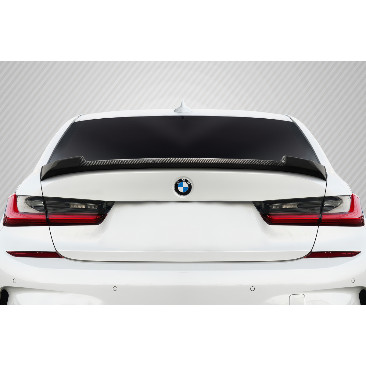 Modify your BMW 3-Series 2019 with our Exterior/Wings - Rear angle view of the car with spoiler