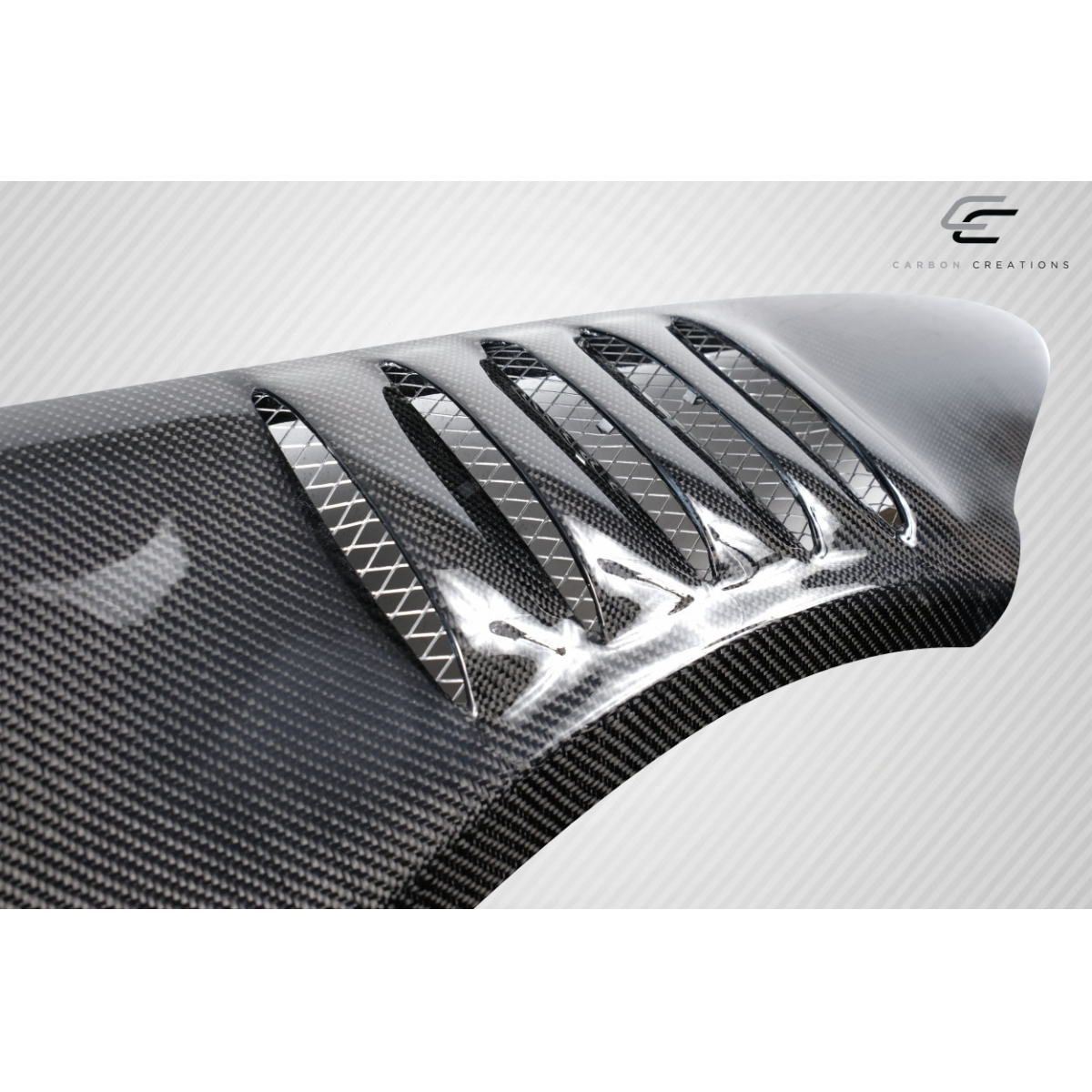 Modify your BMW M3 2008 with our Exterior/Fenders - Angled view showcasing carbon fiber texture and vents