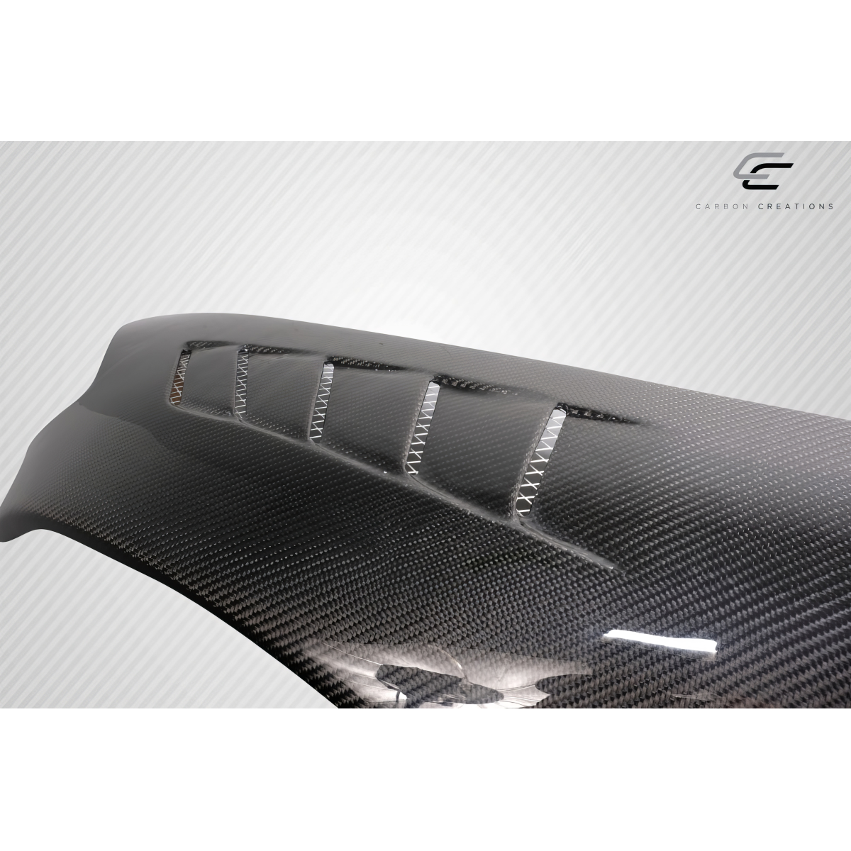 Modify your Honda S2000 2000 with our Exterior/Fenders - Angled view of carbon fiber front fenders