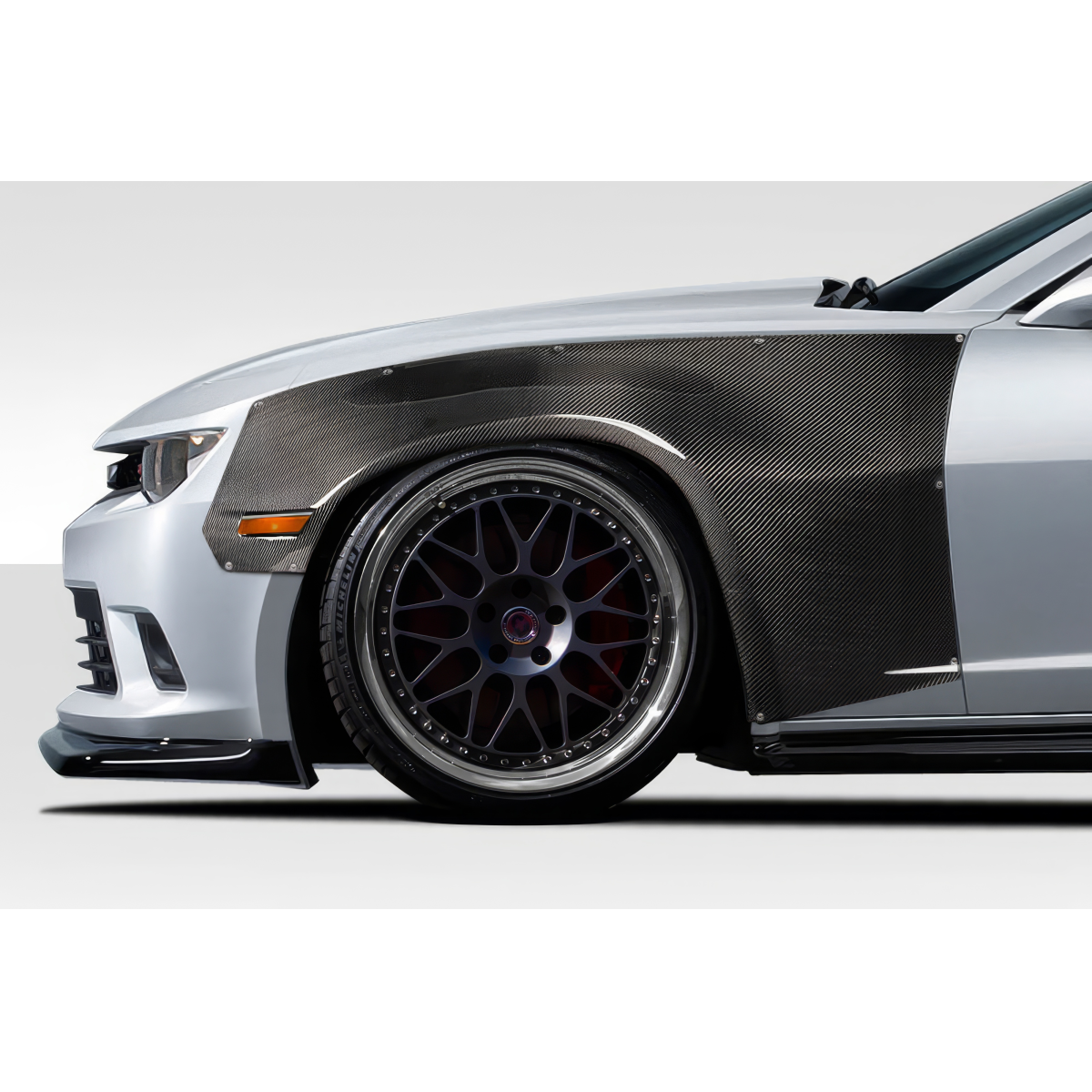 Modify your Chevrolet Camaro 2010 with our Exterior/Fenders - Side view with a focus on fender and wheel