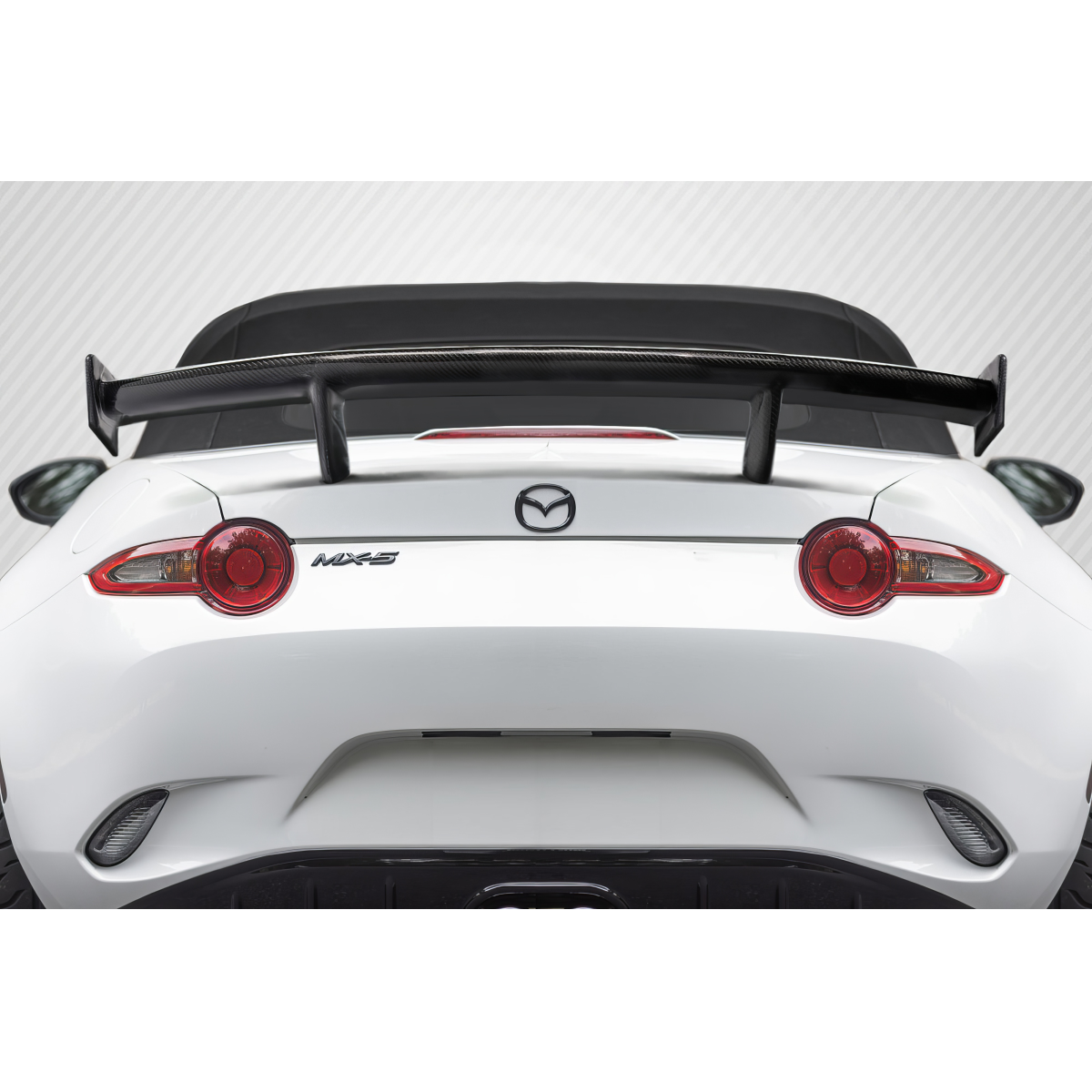 Modify your Mazda Miata 2016 with our Exterior/Wings - Rear view showing spoiler at eye level angle