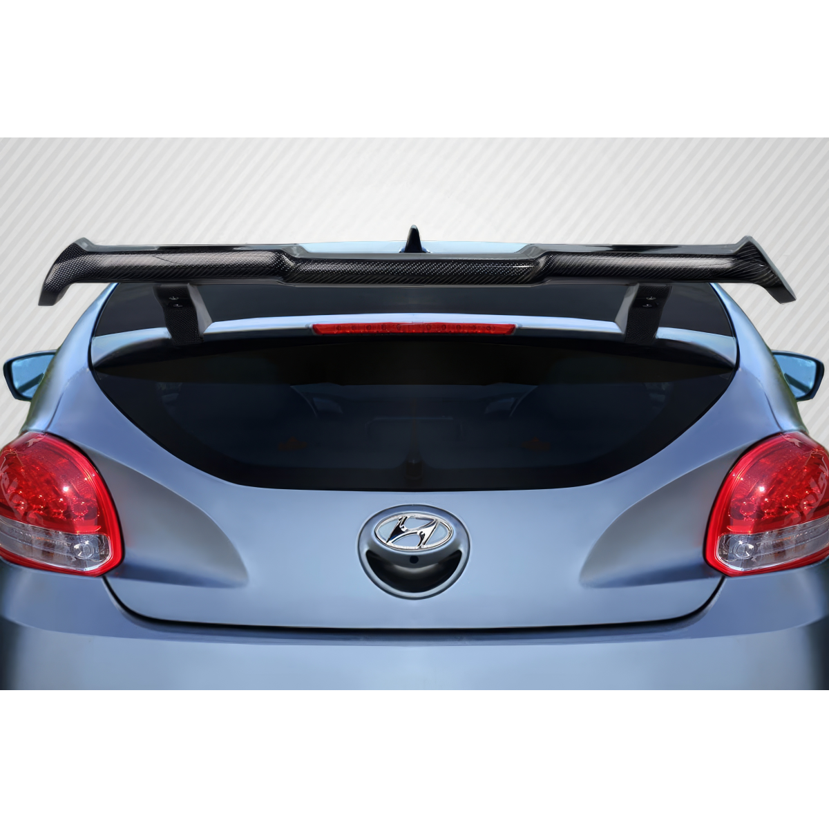 Modify your Hyundai Veloster 2012 with our Exterior/Wings - Rear view angle showing the carbon fiber wing