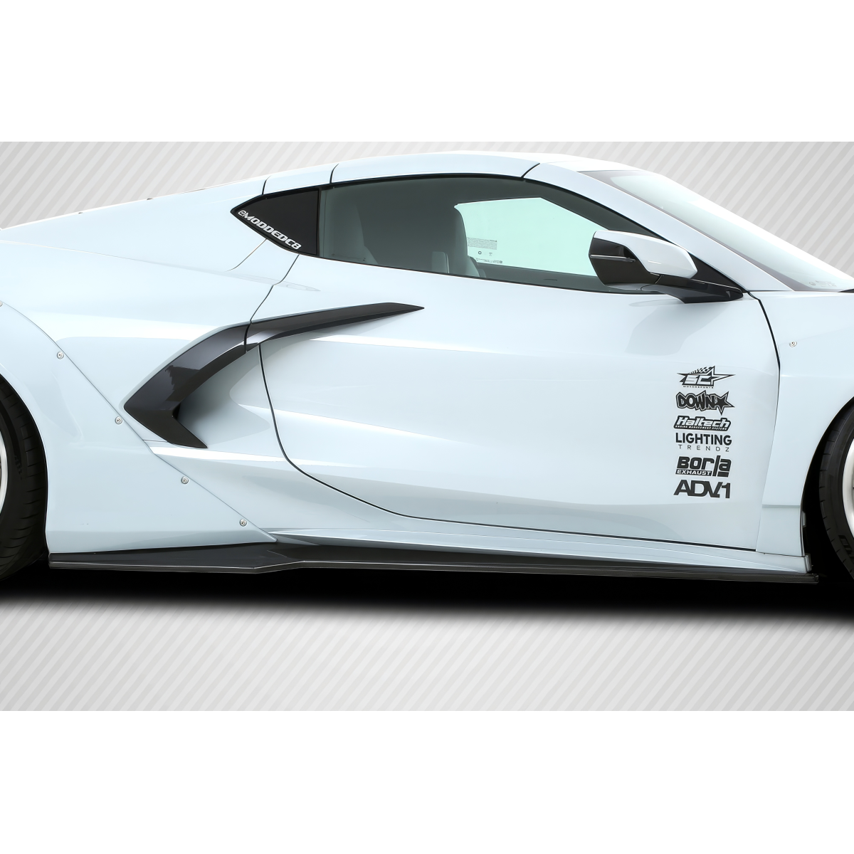 Modify your Chevrolet Corvette 2020 with our Exterior/Other Exterior - Profile view of the car's side skirt splitters