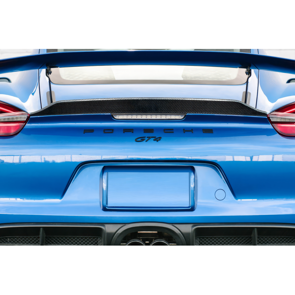 Modify your Porsche Cayman 2014 with our Exterior/Wings - Rear view angle of the car at low elevation