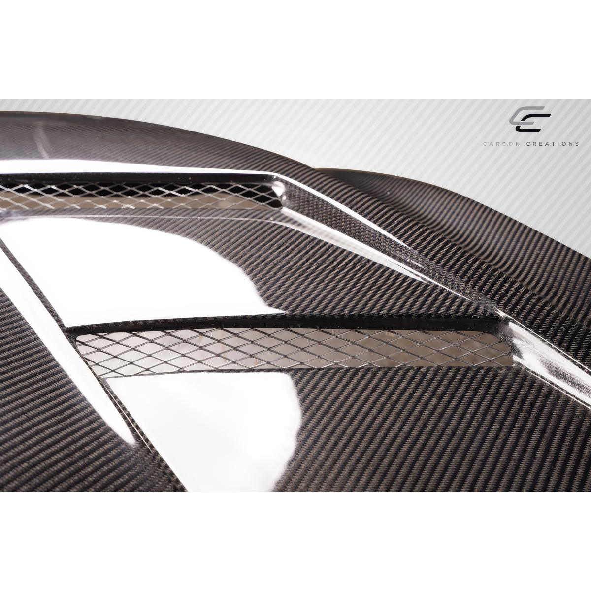 Modify your Ford Mustang 2015 with our Exterior/Hoods - Angled view showing carbon fiber texture and details