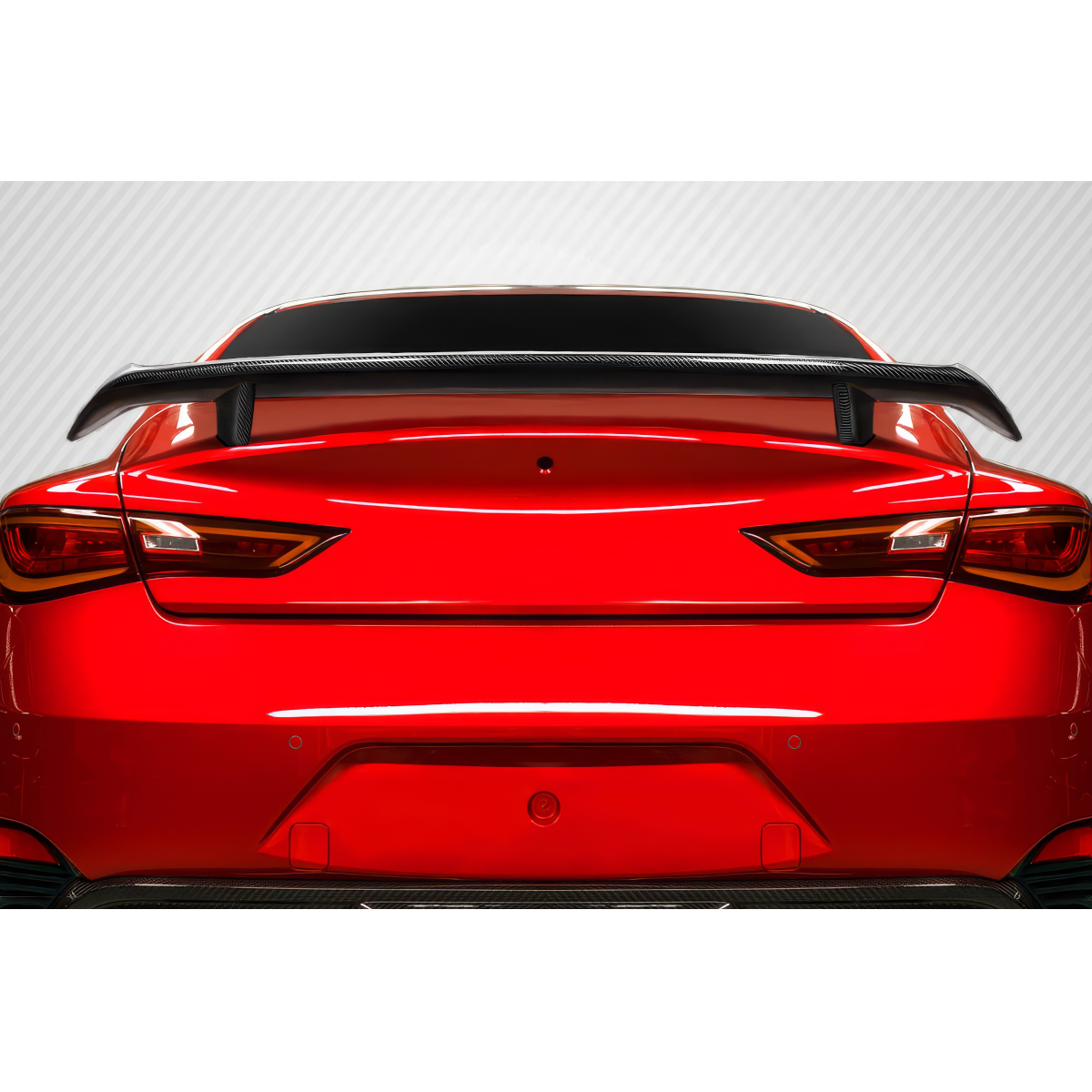 Modify your Infiniti Q60 2017 with our Exterior/Wings - Rear view of car spoiler at a slight angle