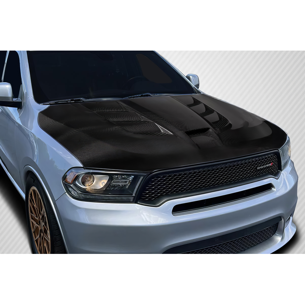 Modify your Dodge Durango 2011 with our Exterior/Hoods - Front angle showing the carbon fiber hood