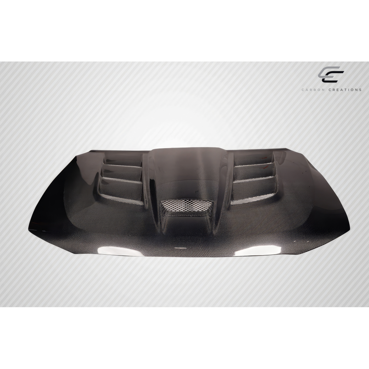 Modify your Dodge Durango 2011 with our Exterior/Hoods - Front view showing carbon fiber hood design