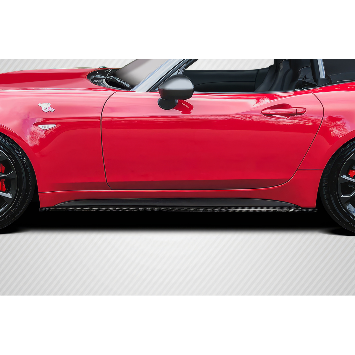 Modify your Fiat 124 Spider 2017 with our Exterior/Other Exterior - Side view of car showing carbon fiber side skirt