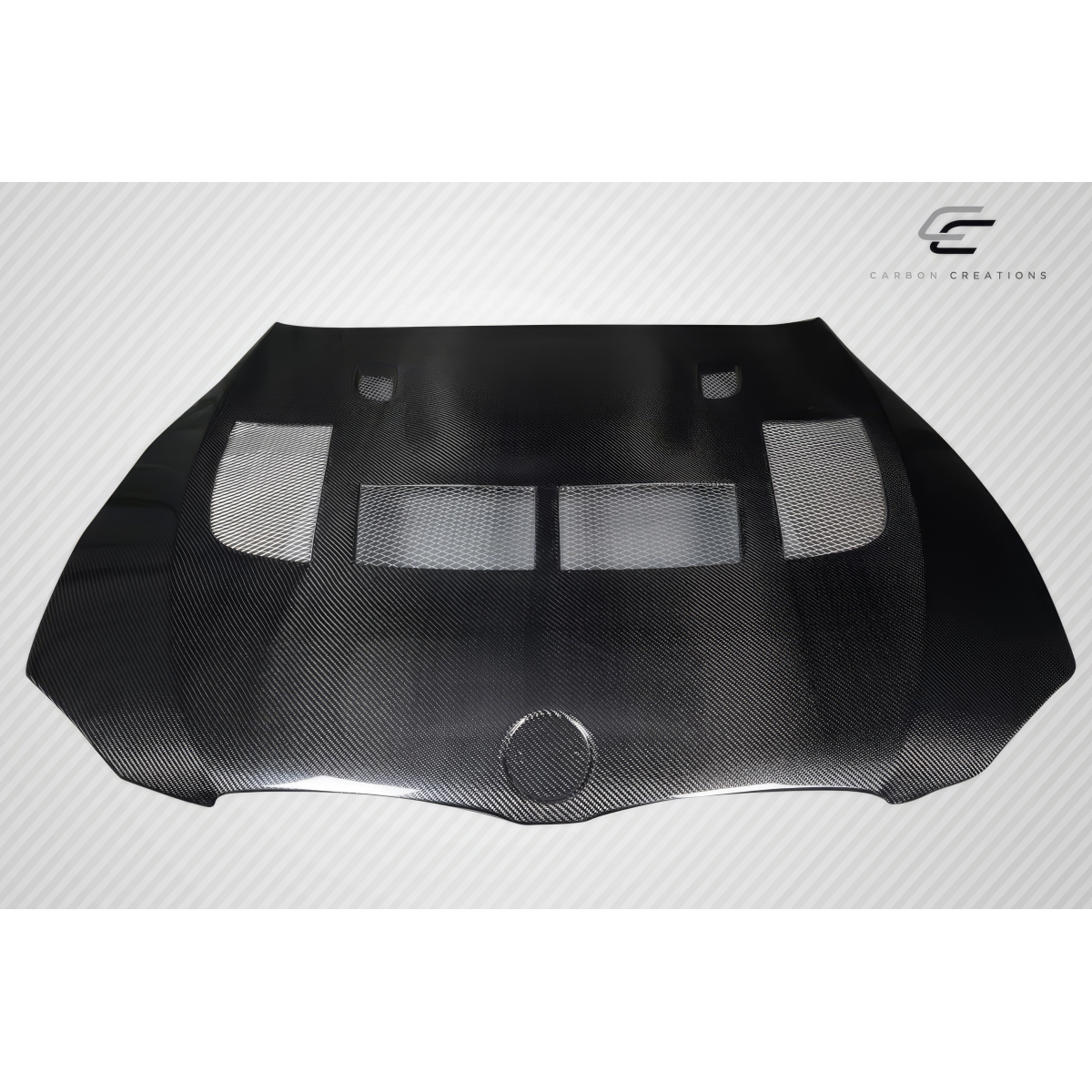 Modify your BMW M3 2008 with our Exterior/Hoods - Top view of carbon fiber hood at a flat angle