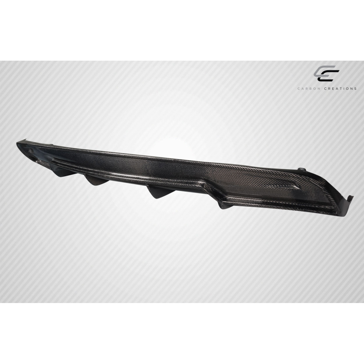 Modify your Tesla S 2012 with our Exterior/Diffusers - Angled view of a carbon fiber rear diffuser