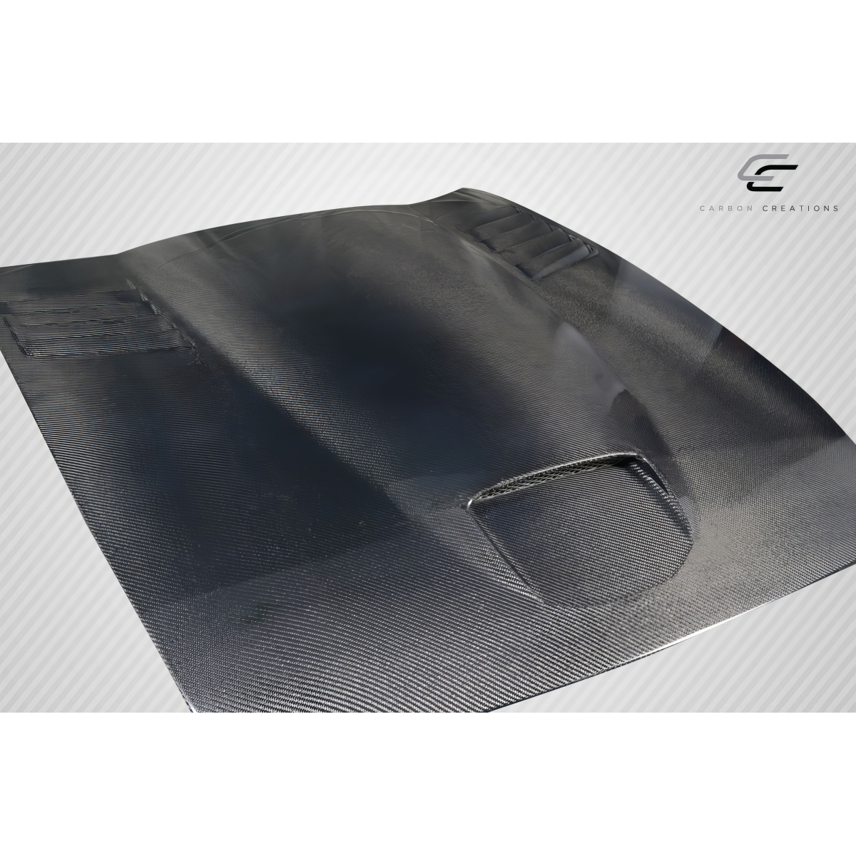Modify your Dodge Viper 2003 with our Exterior/Hoods - Angled view of carbon fiber hood part