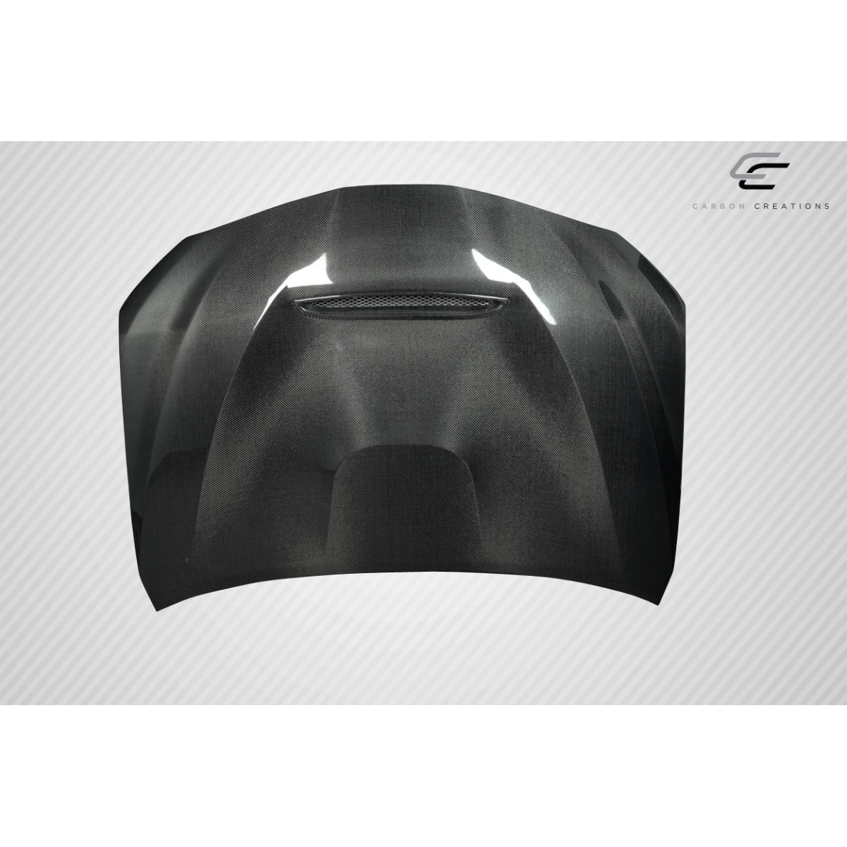 Modify your Toyota Camry 2018 with our Exterior/Hoods - Front view of carbon fiber hood at slight angle