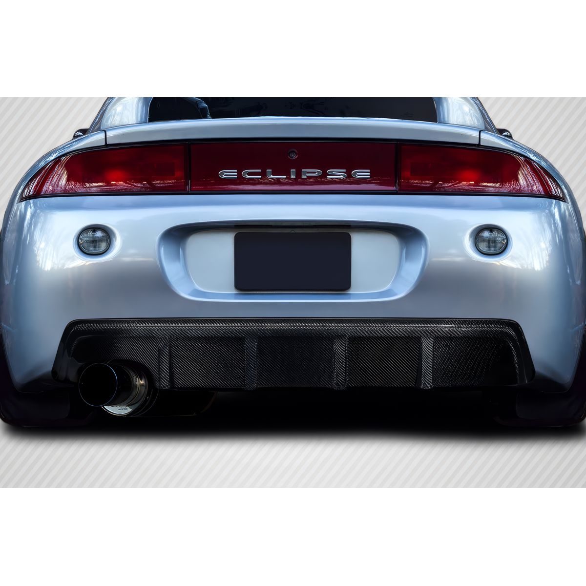 Modify your Mitsubishi Eclipse 1997 with our Exterior/Diffusers - Rear view angle of vehicle showcasing diffuser