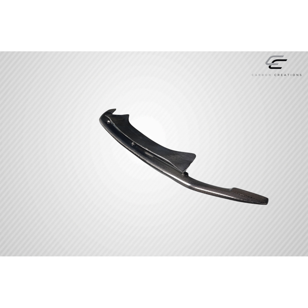 Modify your Honda Accord 2011 with our Exterior/Front Lips - Angled view of a carbon fiber front lip spoiler