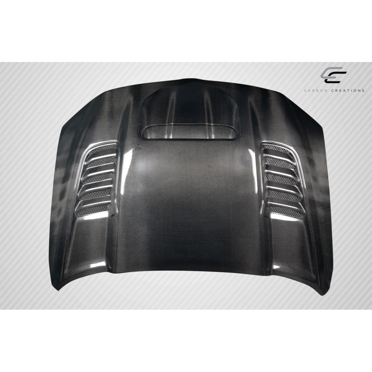 Modify your Dodge Ram 2019 with our Exterior/Hoods - Front view of the hood at a slight angle