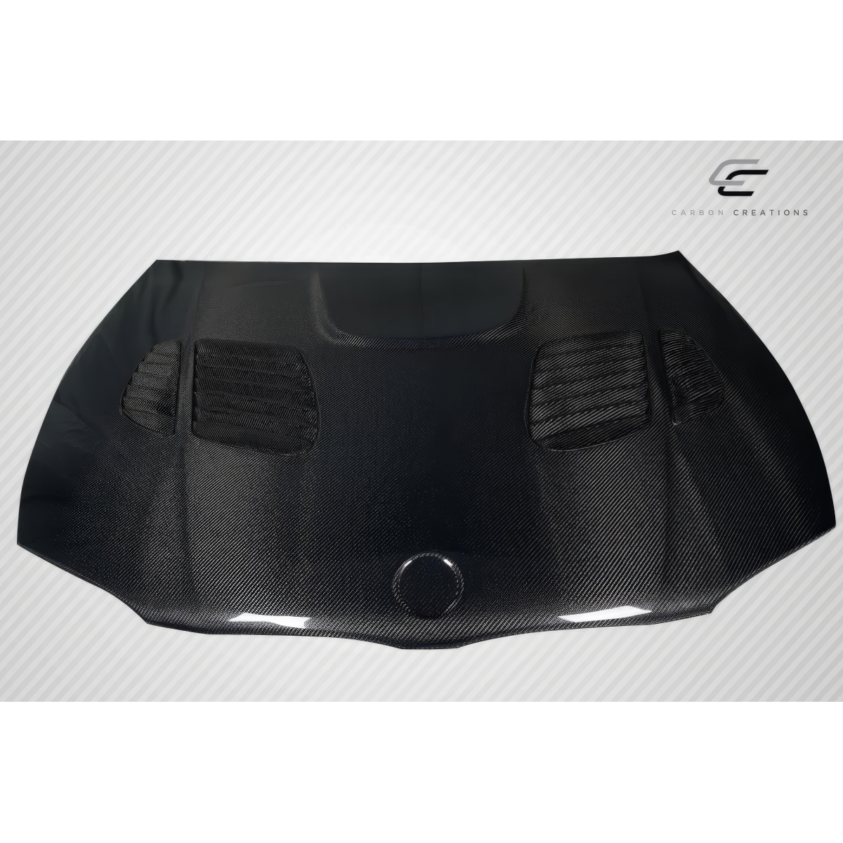 Modify your BMW 1-Series 2008 with our Exterior/Hoods - Front view of carbon fiber hood at a straight angle