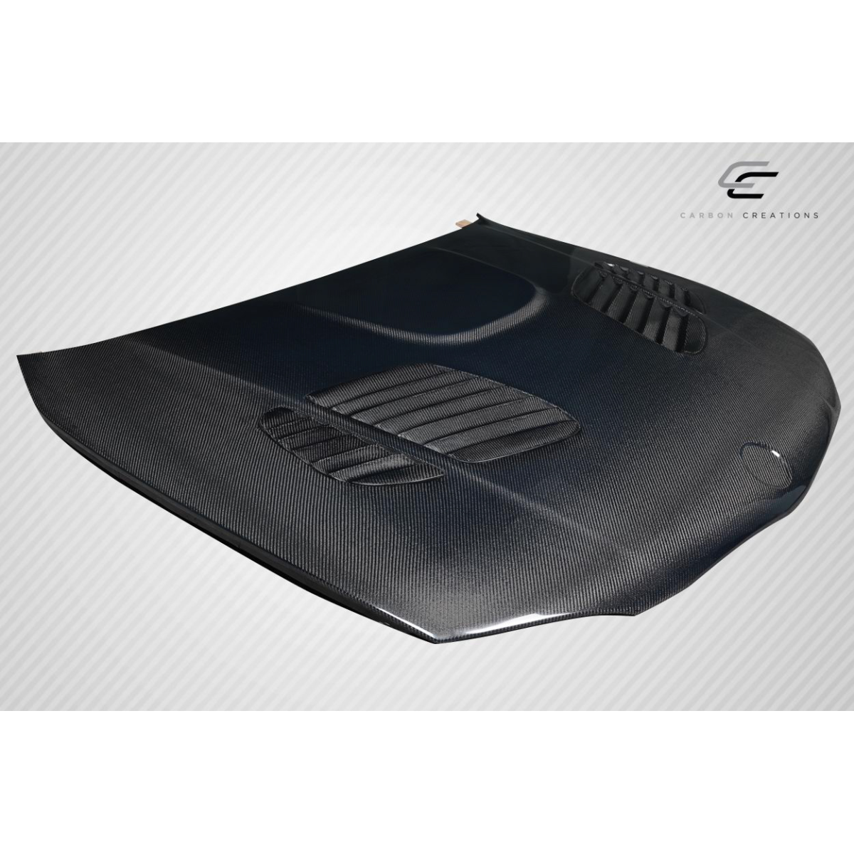 Modify your BMW 1-Series 2008 with our Exterior/Hoods - Part is seen from a slightly elevated angle