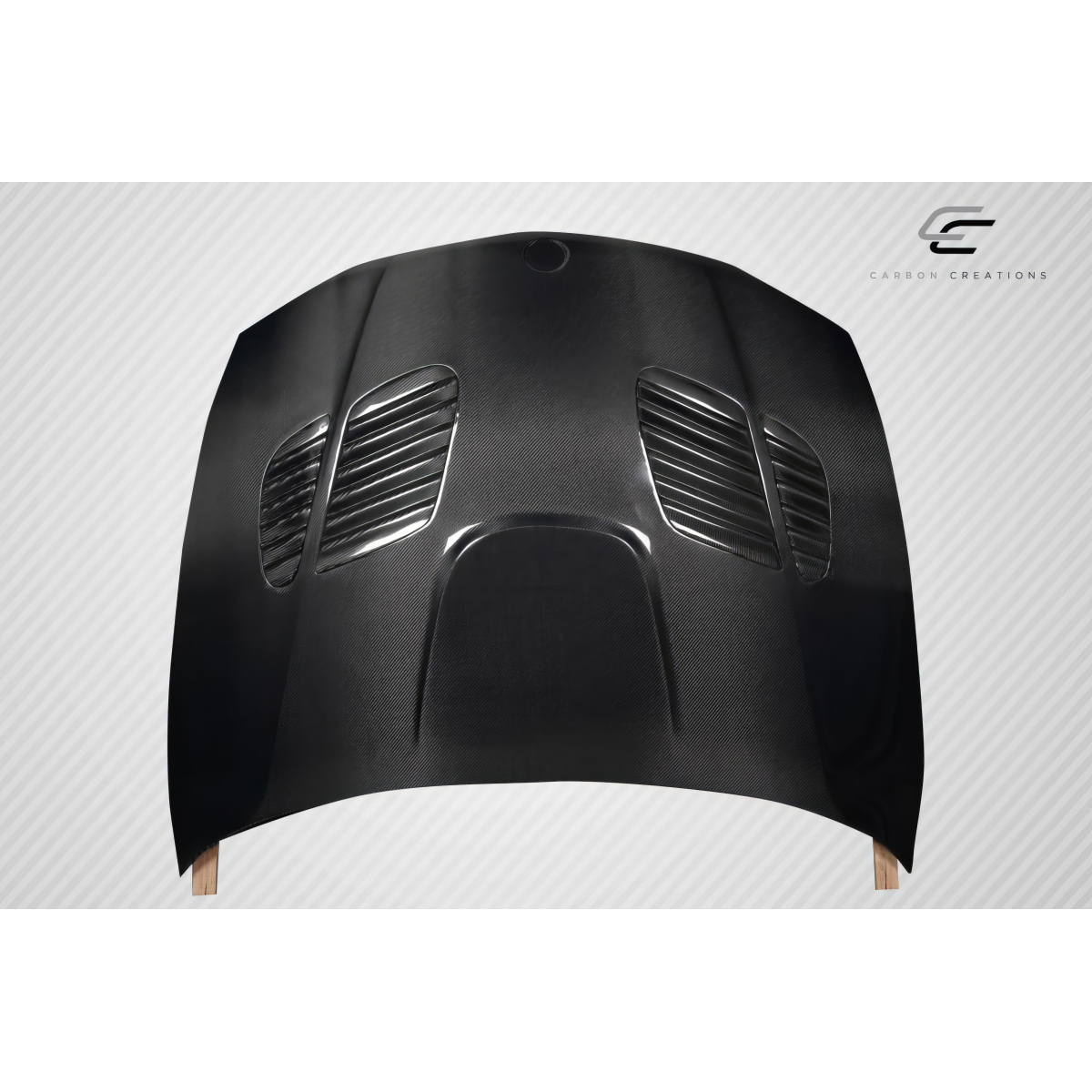 Modify your BMW 1-Series 2008 with our Exterior/Hoods - Top down view of a carbon fiber hood