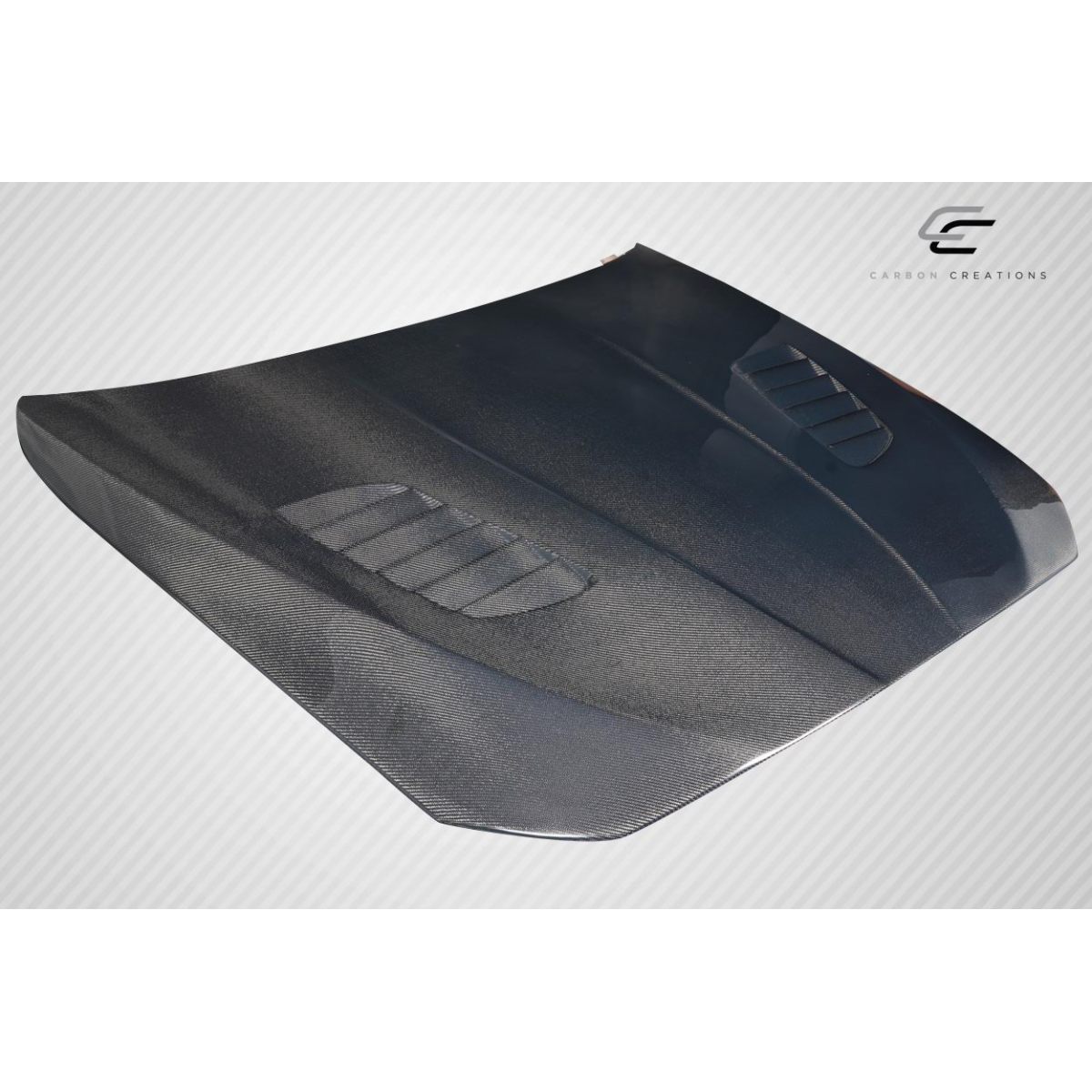 Modify your BMW 5-Series 2011 with our Exterior/Hoods - Angle shows a slightly elevated front view