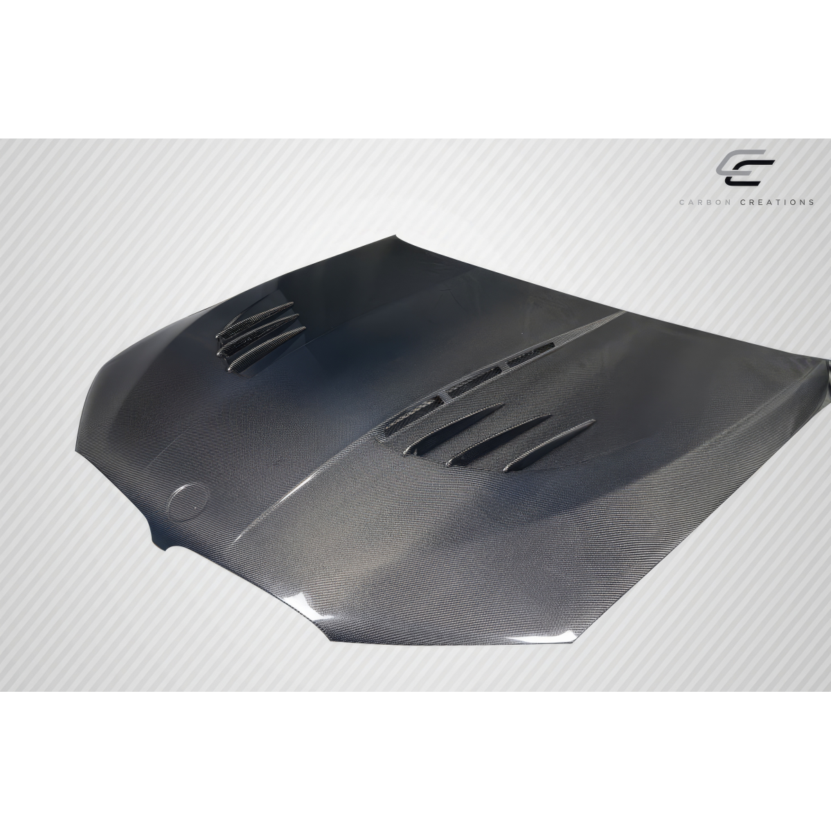 Modify your BMW 5-Series 2017 with our Exterior/Hoods - Top down view of carbon fiber hood at slight angle