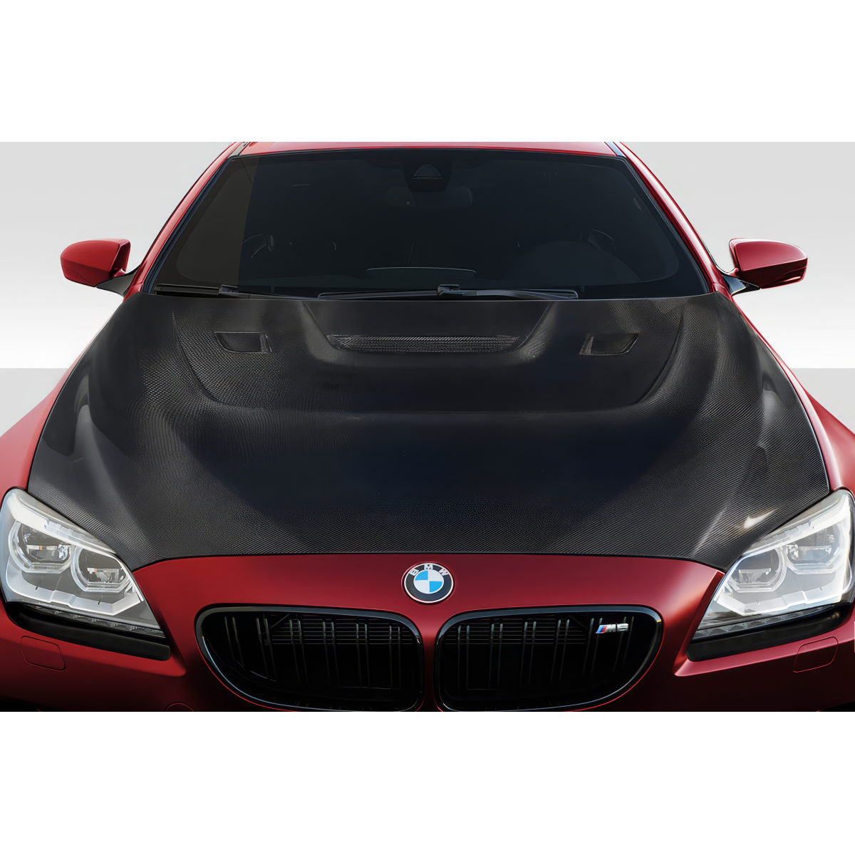 Modify your BMW 6-Series 2011 with our Exterior/Hoods - Front view of carbon fiber hood at slight angle