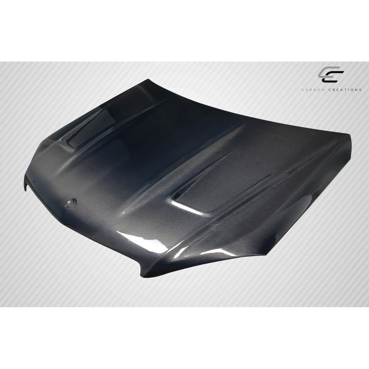 Modify your Mercedes-Benz C300 2008 with our Exterior/Hoods - Angled view showcasing carbon fiber hood design