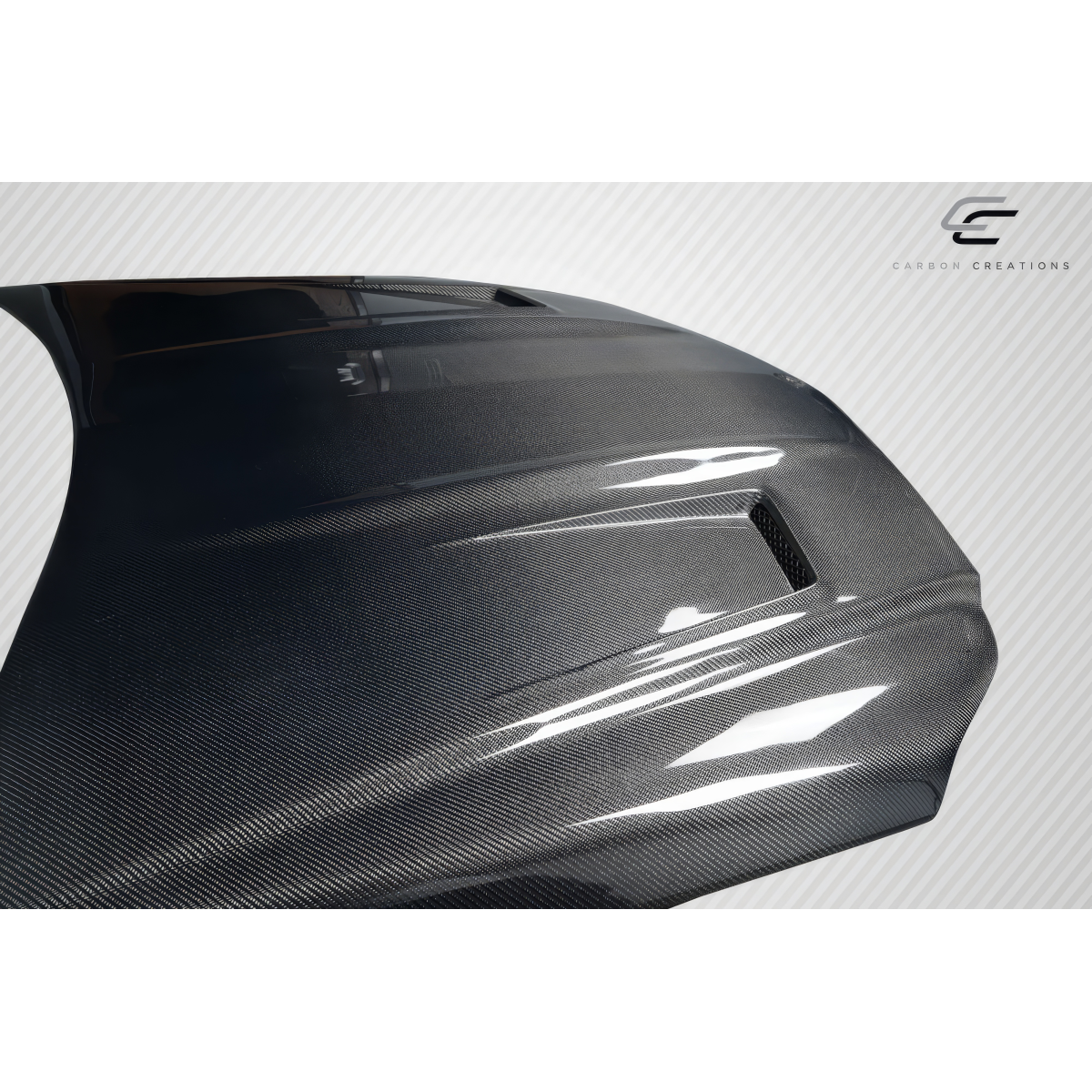 Modify your Mercedes-Benz C300 2012 with our Exterior/Hoods - Angled view showcasing carbon fiber texture