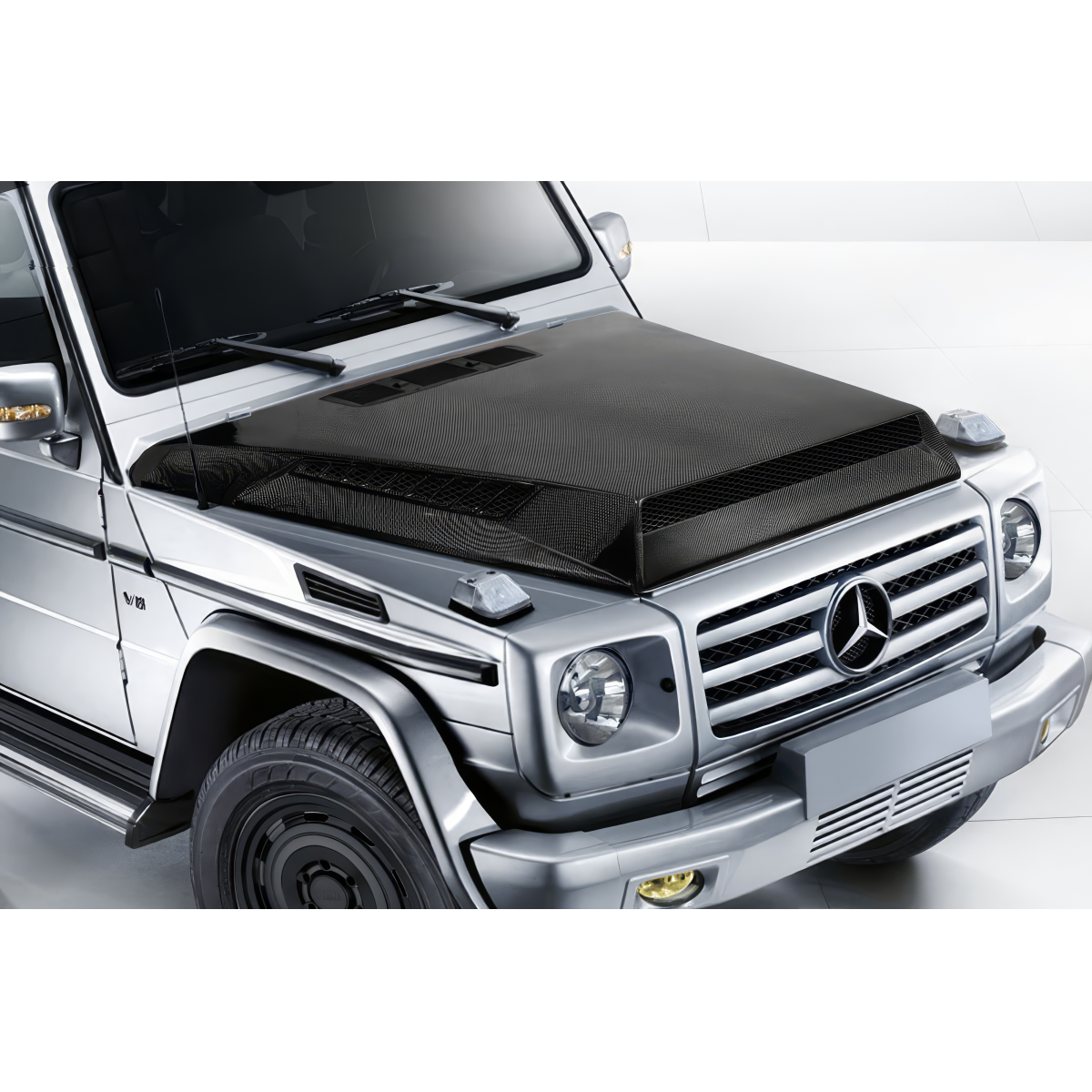 Modify your Mercedes-Benz G-Class 2000 with our Exterior/Hoods - View from the front and slightly above