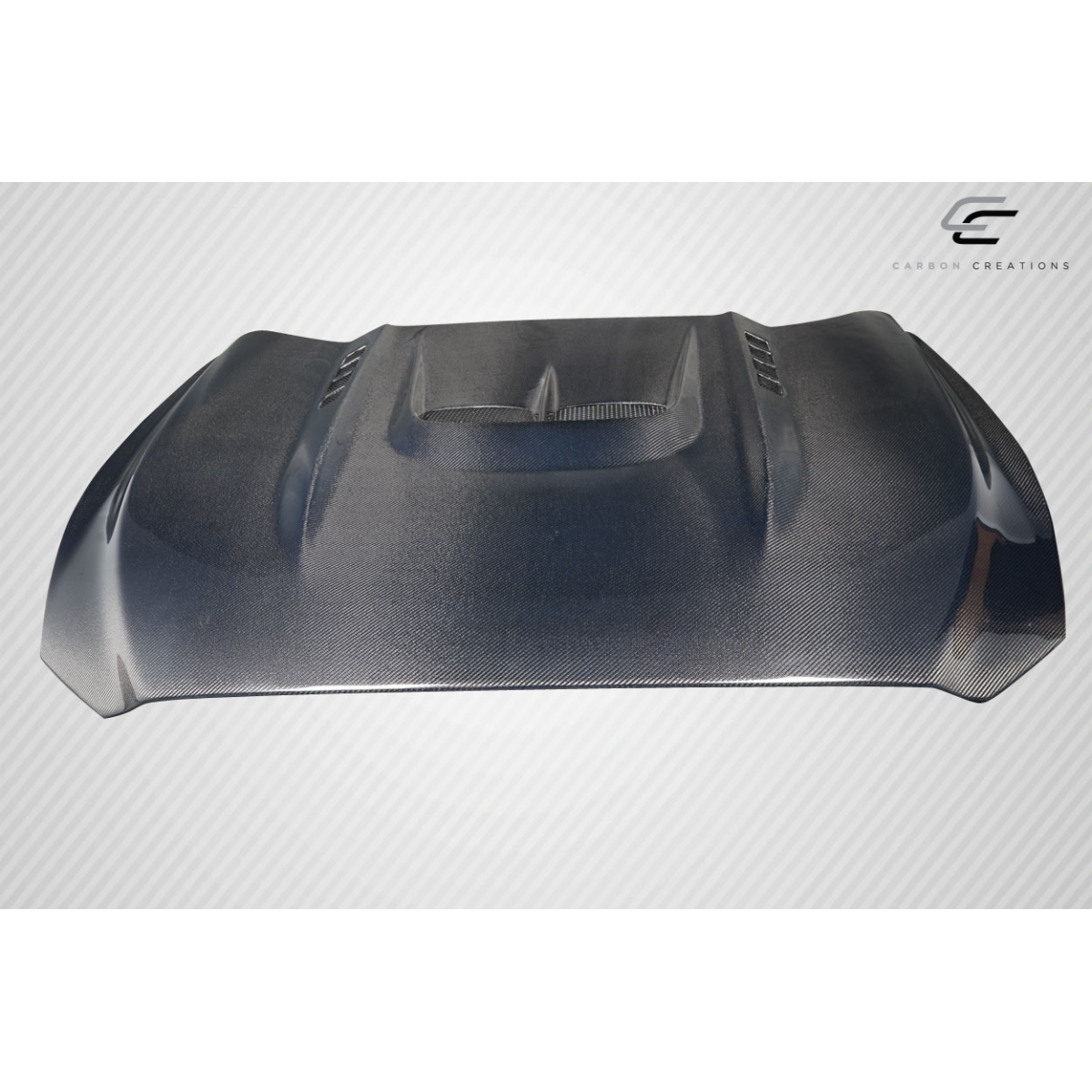 Modify your Ford Mustang 2015 with our Exterior/Hoods - Top down view of carbon fiber hood at slight angle