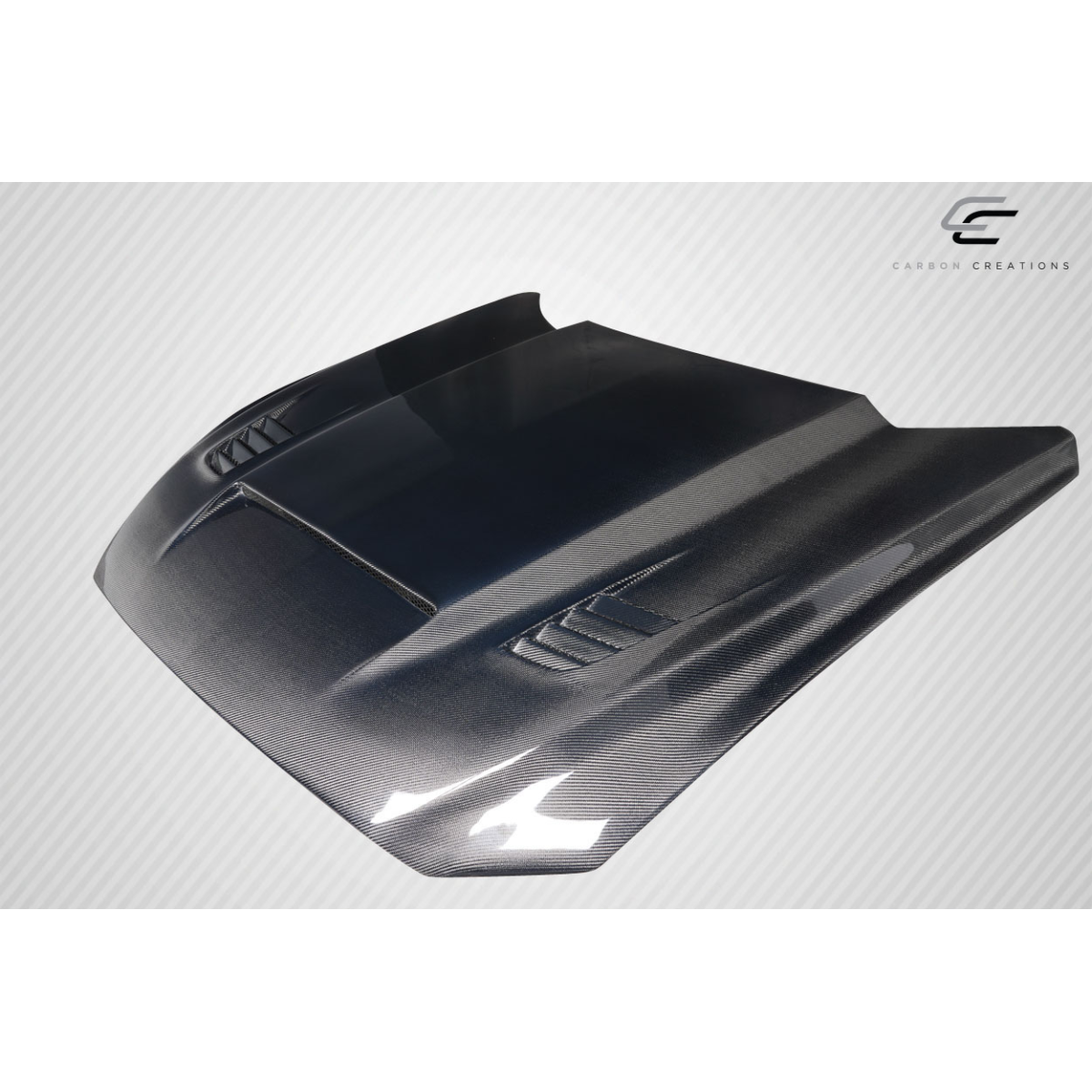 Modify your Ford Mustang 2015 with our Exterior/Hoods - Angled view showing the carbon fiber hood part