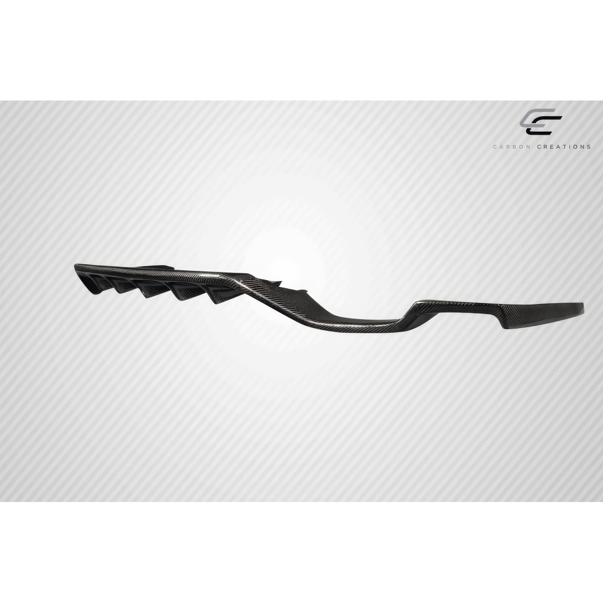 Modify your Universal   with our Exterior/Diffusers - Side angle view of a carbon fiber rear diffuser