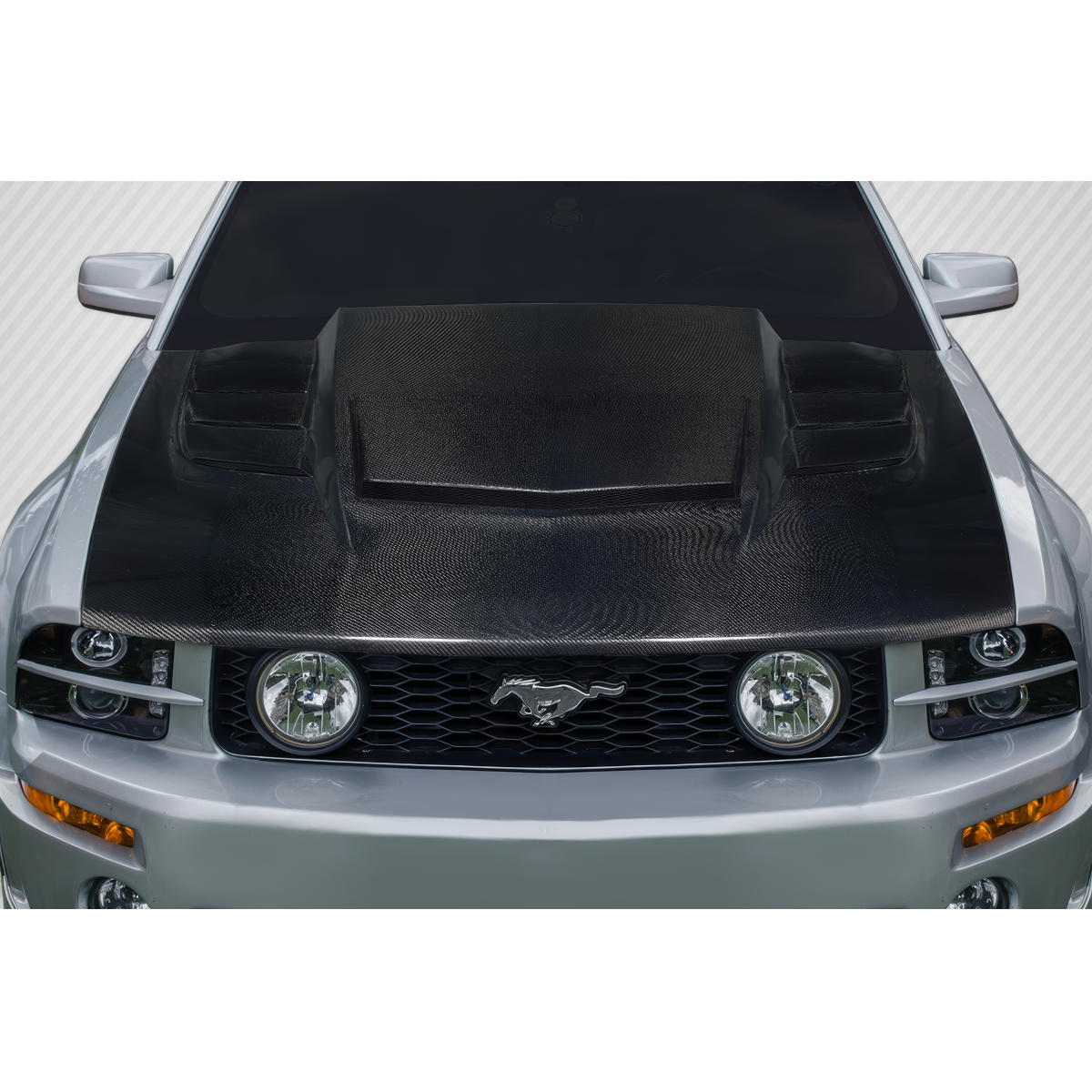 Modify your Ford Mustang 2005 with our Exterior/Hoods - Front view of a carbon fiber hood on a Mustang