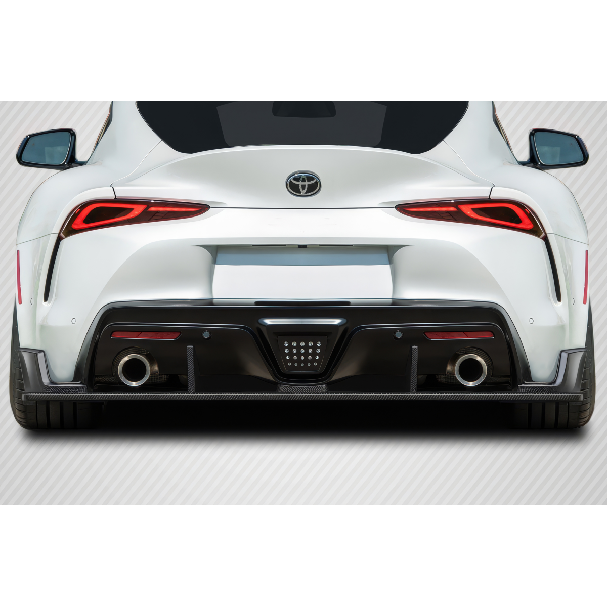 Modify your Toyota Supra 2019 with our Exterior/Diffusers - Rear view angle showing diffuser and exhaust tips