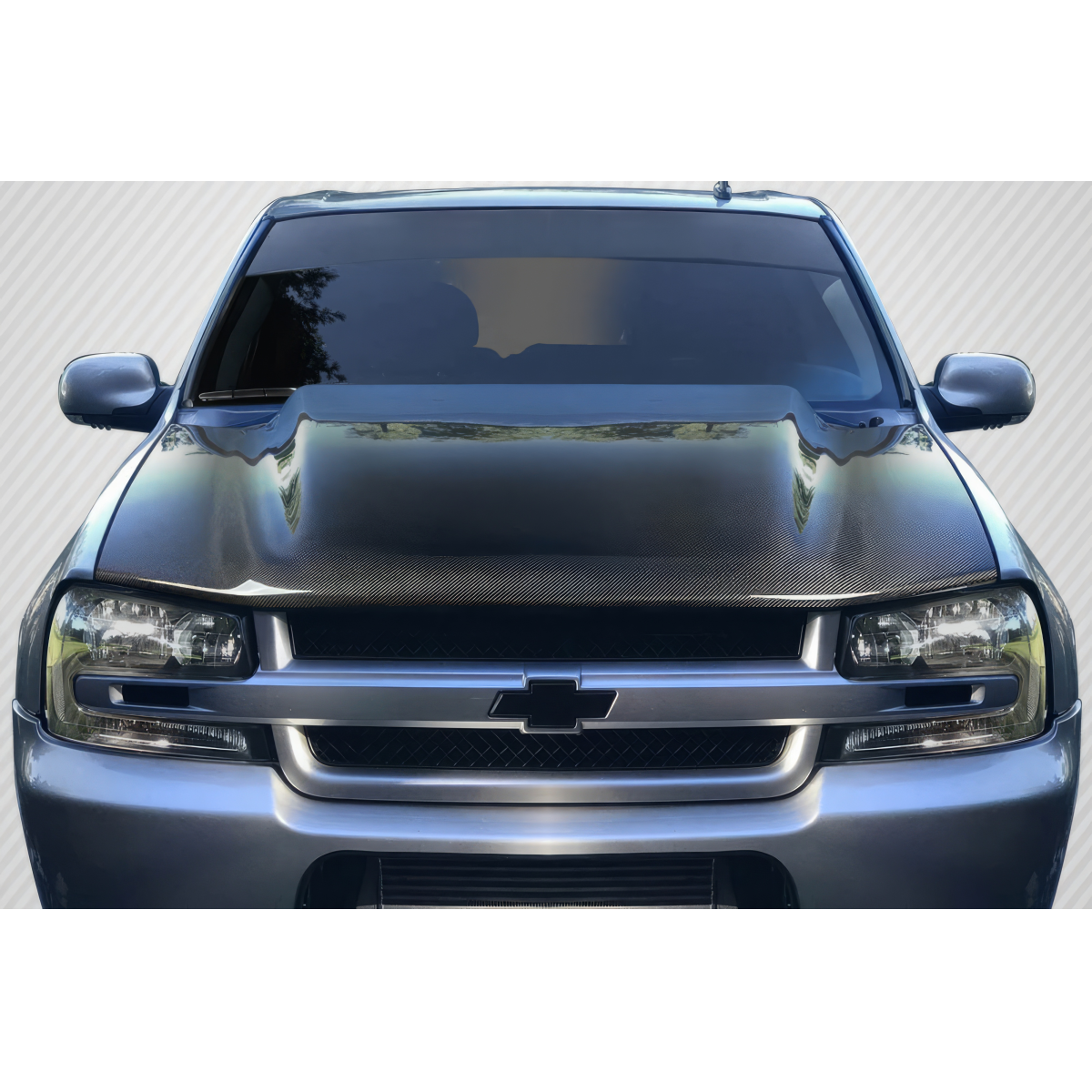 Modify your Chevrolet Trailblazer 2002 with our Exterior/Hoods - Front view of vehicle with carbon fiber hood