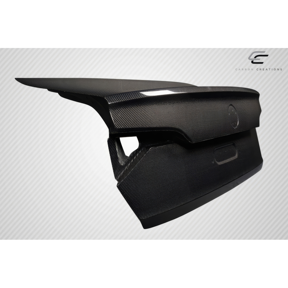 Modify your Volkswagen Jetta 2019 with our Exterior/Trunks - Side angle view of carbon fiber trunk part