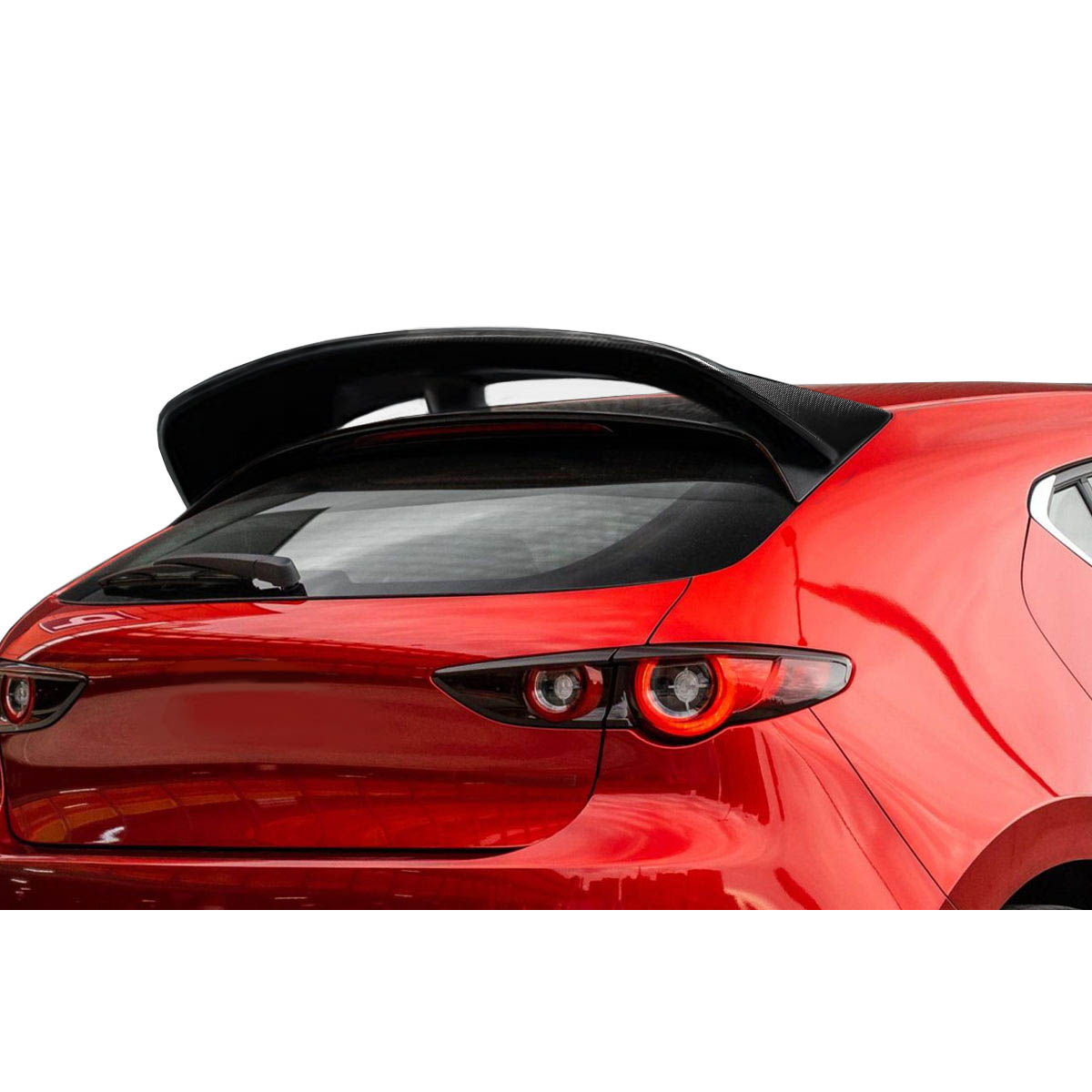 Modify your Mazda 3 2019 with our Exterior/Wings - Rear angle showing Mazda 3 carbon fiber spoiler