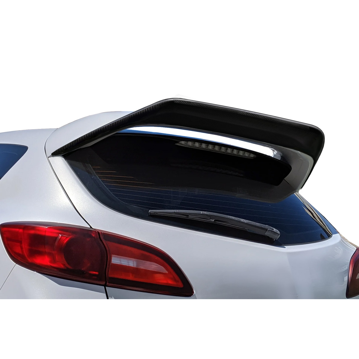 Modify your Mazda 3 2010 with our Exterior/Wings - Rear angle view of carbon fiber wing spoiler