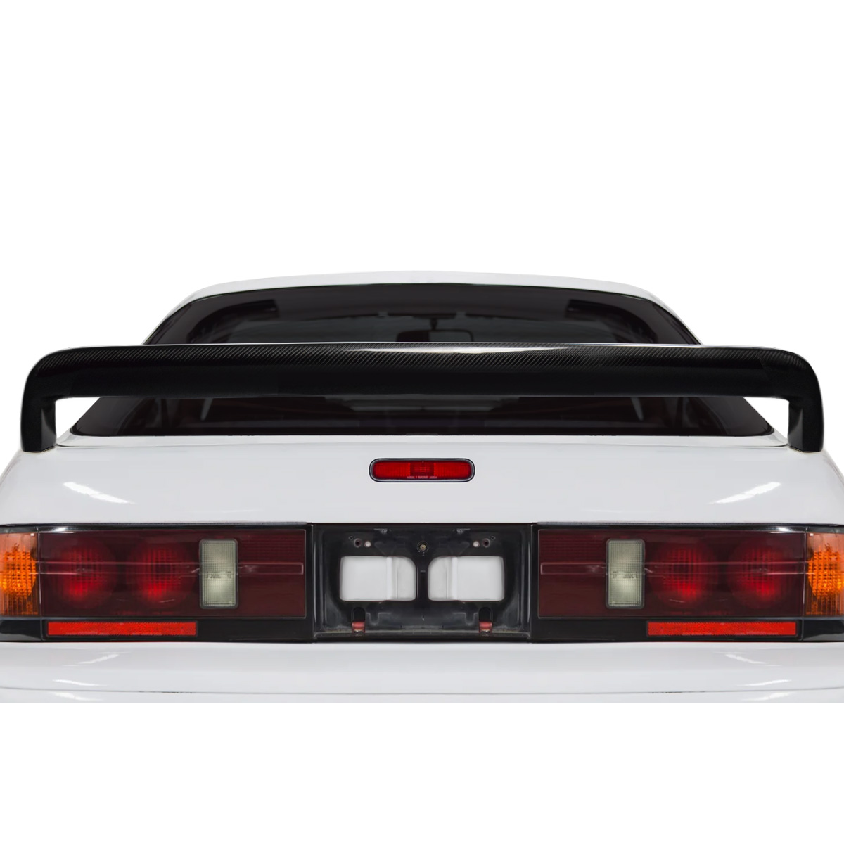 Modify your Mazda RX-7 1986 with our Exterior/Wings - The image shows a rear view of the spoiler