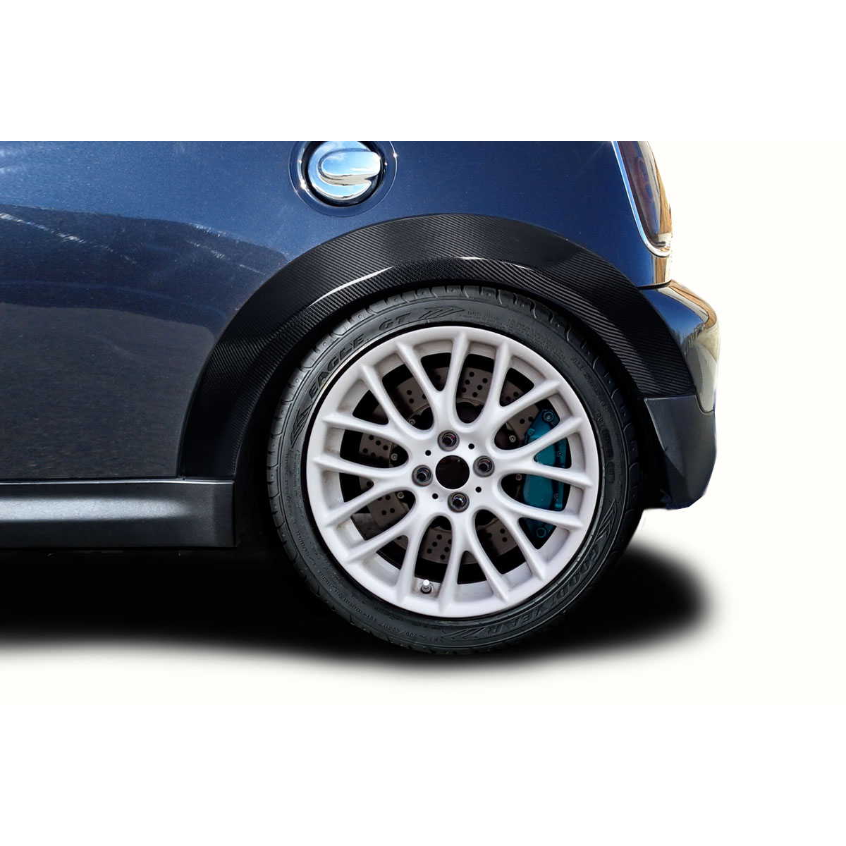 Modify your Mini Cooper 2007 with our Exterior/Fenders - View of rear fender and wheel at a side angle