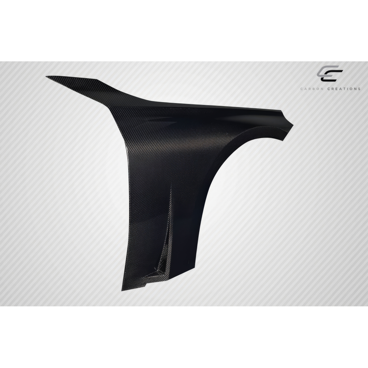 Modify your BMW 2-Series 2023 with our Exterior/Fenders - Showing angled view of carbon fiber fender part